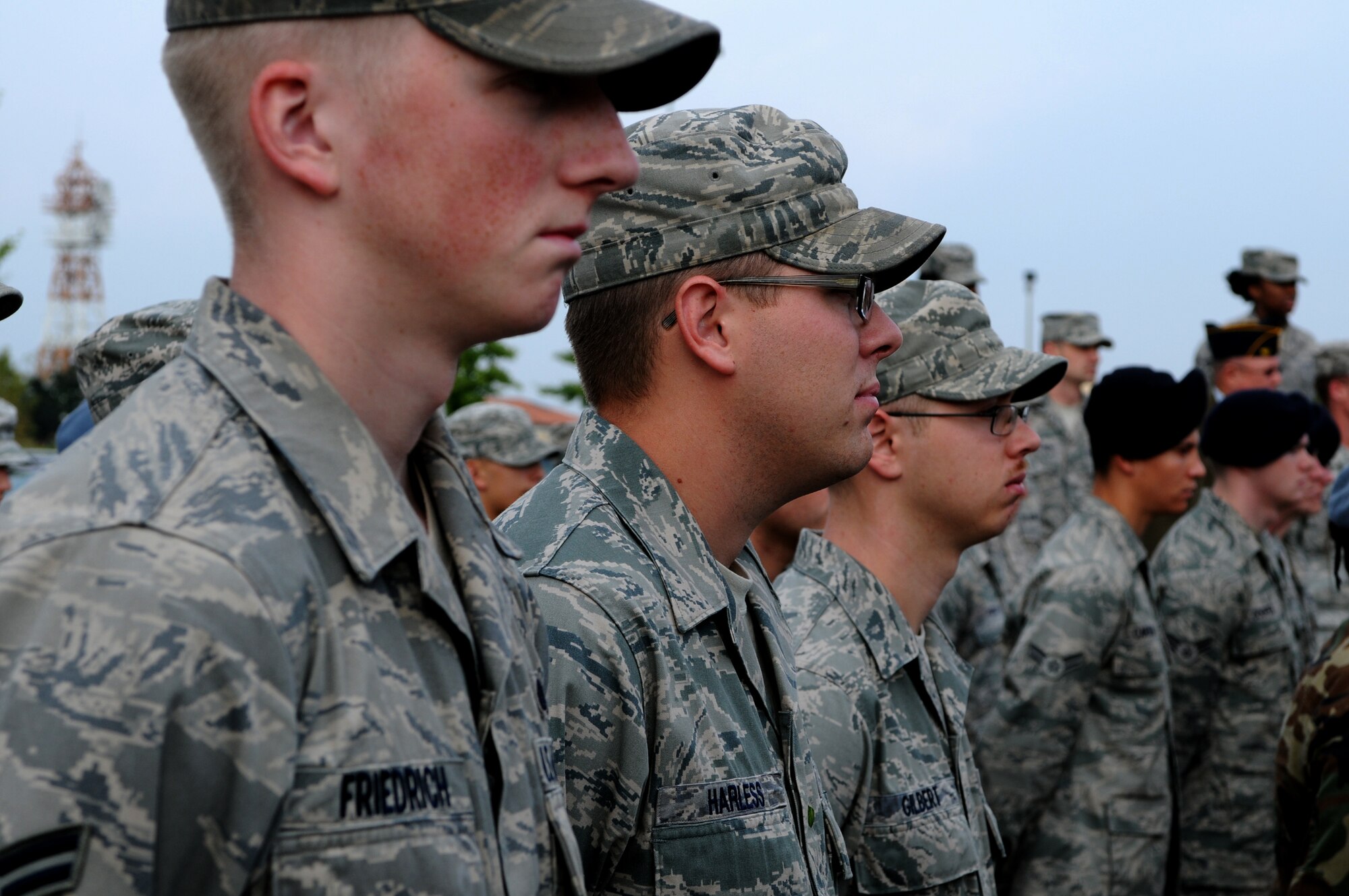 Airmen with the 31st Fighter Wing stand at parade rest during a POW/MIA Week commemoration ceremony Sept. 30 at the 31st Fighter Wing Headquarters. (U.S. Air Force photo/Staff Sgt. Julius Delos Reyes)