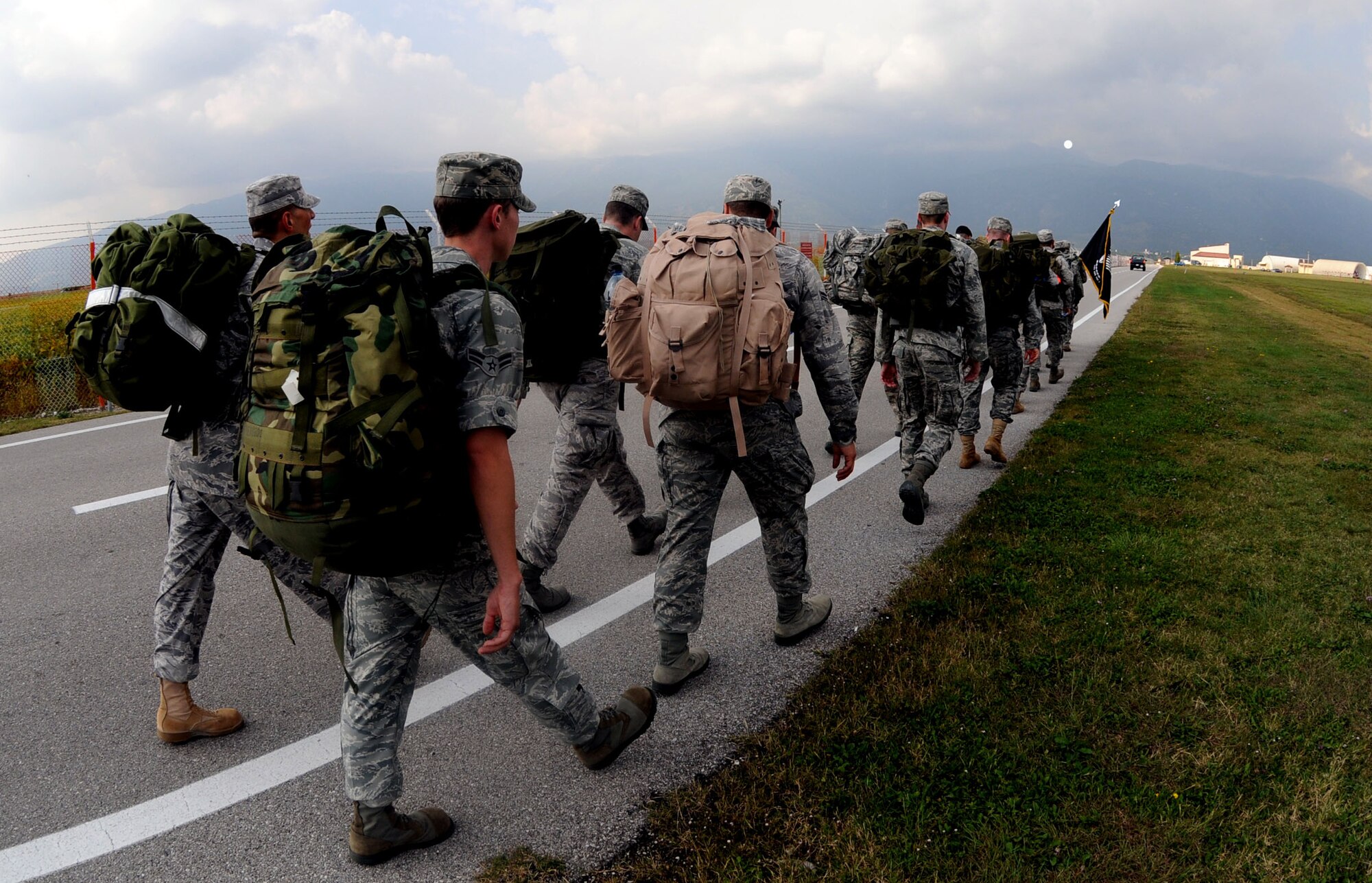 Airmen participate in the 10K remembrance ruck march Sept. 30. This event was part of the POW/MIA Week commemoration activities hosted by the Air Force Sergeants Association. (U.S. Air Force photo/Staff Sgt. Julius Delos Reyes)