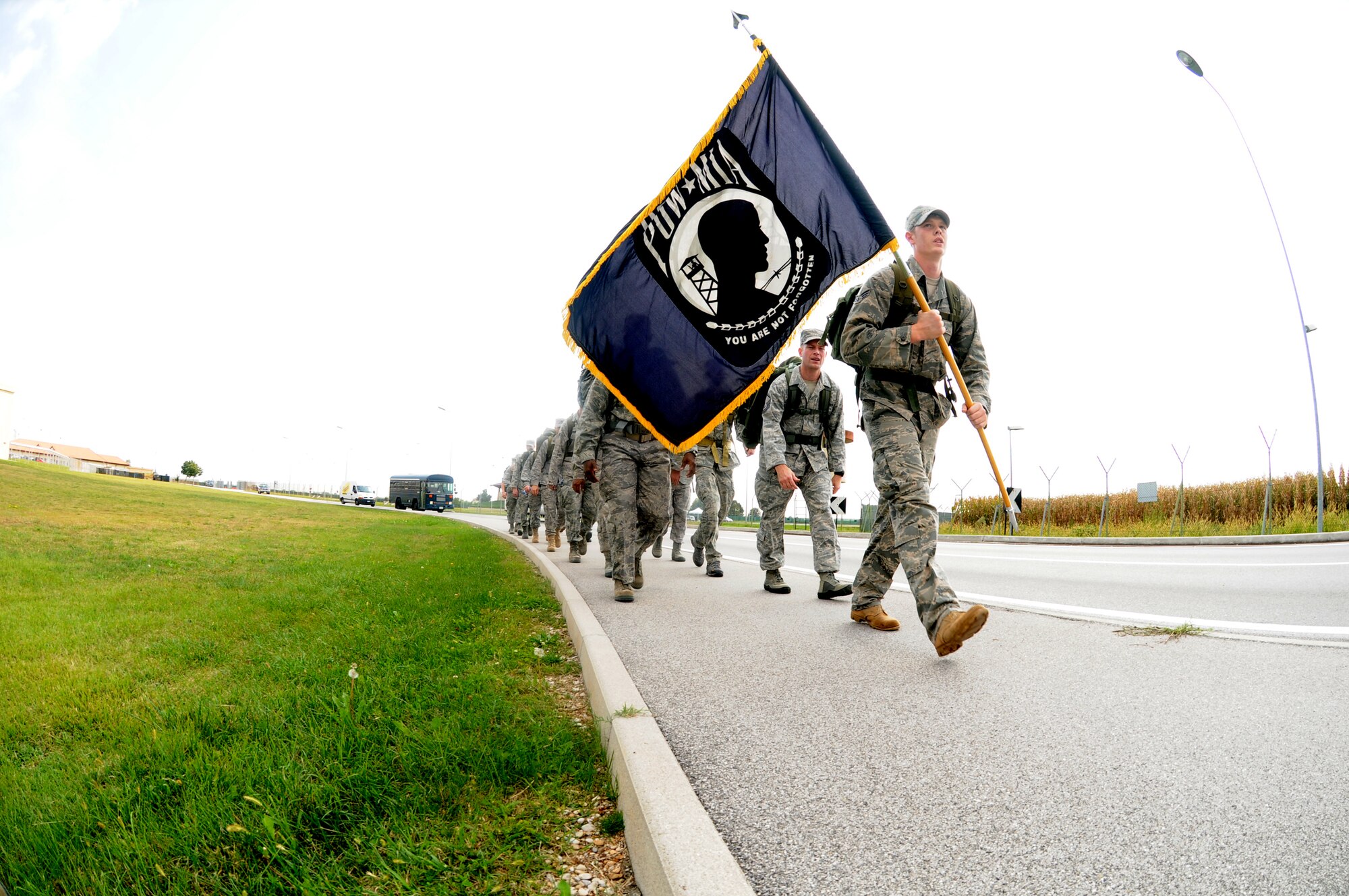 Airmen participate in the 10K remembrance ruck march Sept. 30. This event was part of the POW/MIA Week commemoration activities hosted by the Air Force Sergeants Association. (U.S. Air Force photo/Staff Sgt. Julius Delos Reyes)