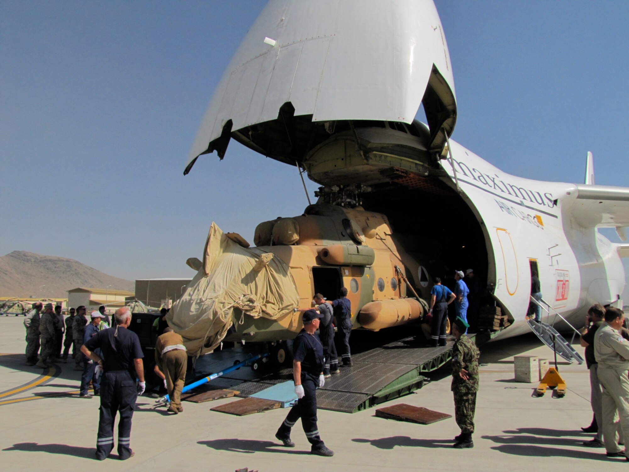 The Afghan Air Force accepts delivery on four Mi-17 V5 helicopters at the air force base in Kabul on October 4, 2010. (Mass Communications Specialist First Class Elizabeth Burke/RELEASED).