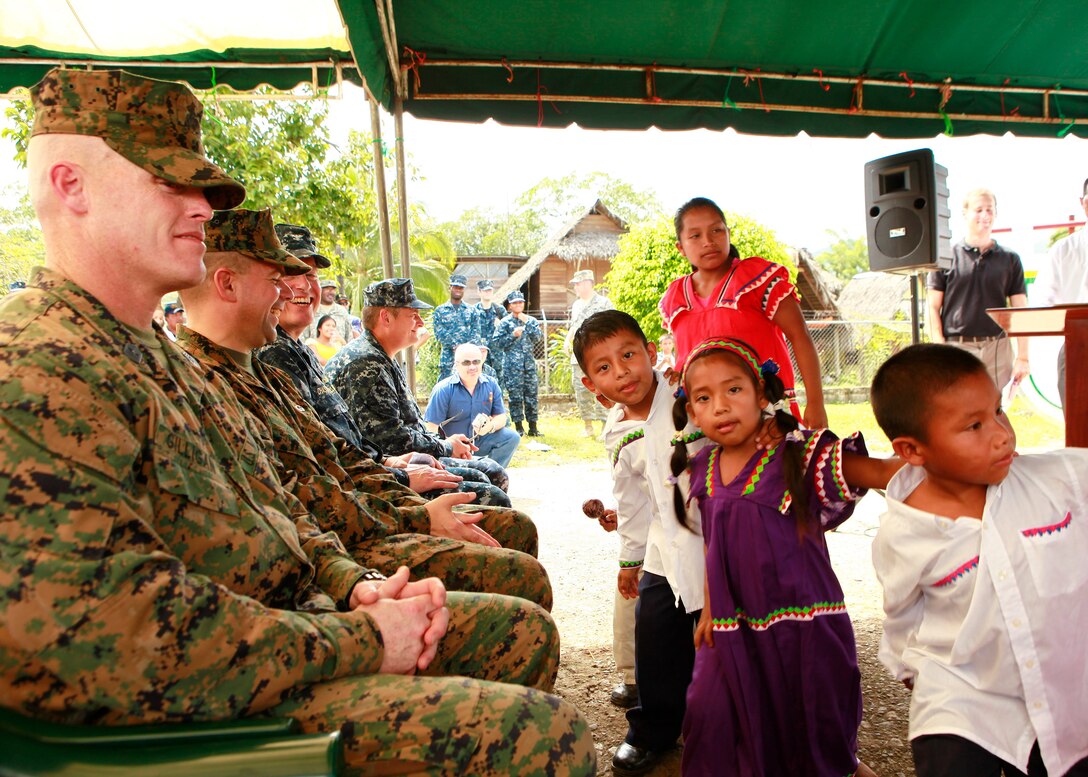 Left, leaders of Operation Continuing Promise 2010, observe a dance performance by Panamanian school children, at a closing ceremony of humanitarian assistance operations in Chiriqui Grande, Panama, Oct. 6. Service members and civilians are deployed in support of CP10 providing medical, dental, veterinary, engineering assistance and subject-matter exchanges to Caribbean, Central and South American nations.