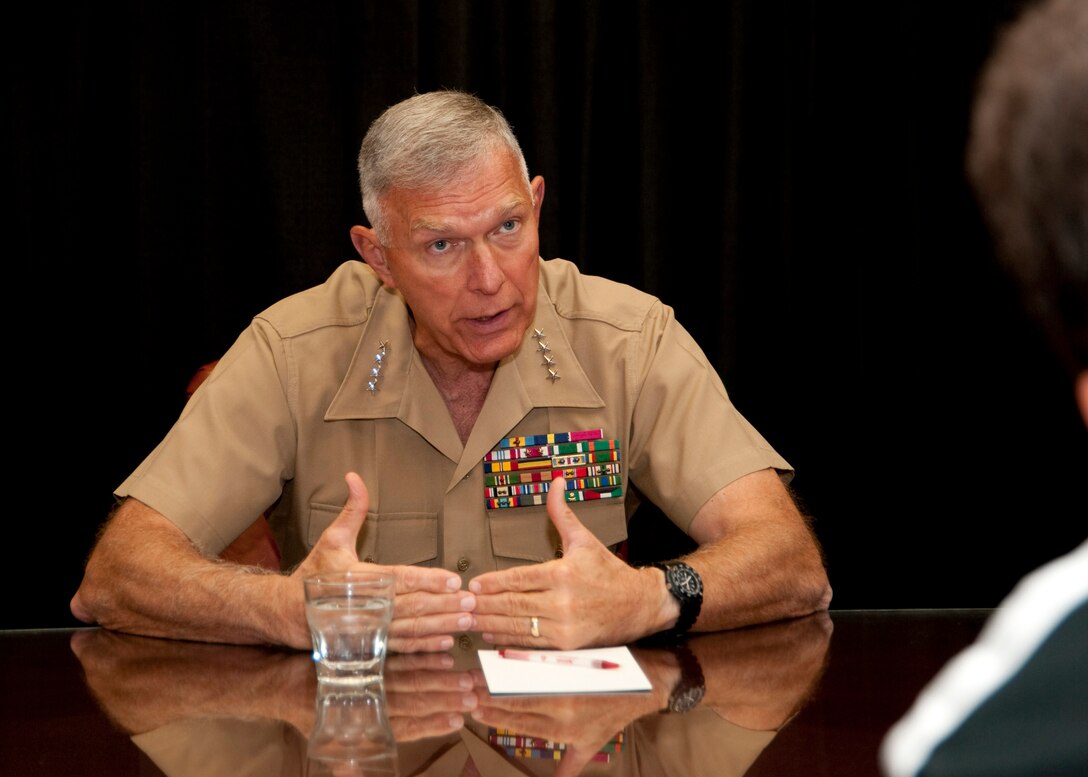 Commandant of the Marine Corps Gen. James T. Conway meets with the press following his presentation at this year's Expeditionary Warfare Conference Oct. 5, 2010. Conway delivered four specific challenges to military and industry participants: to develop lighter-weight armor, vehicles, personal equipment, and weapons systems; discover better ways to become energy self-sufficient; find innovative ways to manage waste; and to bolster America's support for  Marines, sailors, airmen and soldiers.