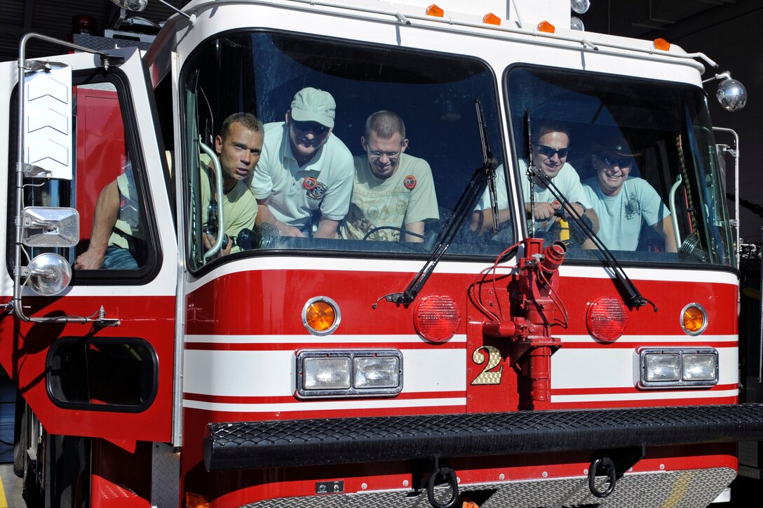 ELLSWORTH AFB, S.D. – A group of firefighters and family members from Apolda, Germany tour the Ellsworth fire department, Oct. 6.  The tour was part of a sister city exchange program between Rapid City, S.D. and Apolda. (U.S. Air Force photo/Staff Sgt. Marc I. Lane)