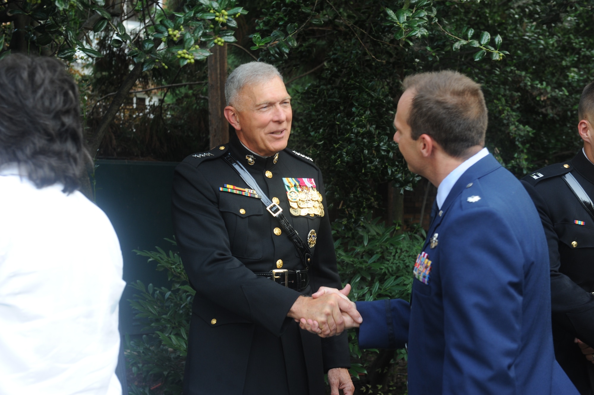 The Commandant of the Marine Corps, General James T. Conway, greets Air Force Lt. Col. Paul Thompson, co-founder of The Ride for Semper Fi, during an evening  parade July 23, 2010 at Marine Barracks Washington, D.C. (United States Marine Corps photo/ Cpl. Erin A. Kirk-Cuomo)