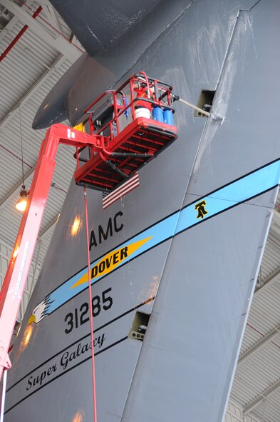 STEWART AIR NATIONAL GUARD BASE, N.Y. -- A contractor washes the first production C-5M Super Galaxy during the initial phase of reconditioning by the 105th Airlift Wing Oct. 6, 2010 at Stewart Air National Guard Base, N.Y.  An Air National Guard, Reserve, active duty and contractor maintenance team will complete annual inspection, interior restoration and a new look for this aircraft and eventually the entire C-5M fleet.  New engines and upgrades significantly enhance the C-5M's performance, reliability and maintainability.  The aircraft left the Lockheed Martin plant in Marietta, Ga. Sept. 30 and is scheduled for delivery to Dover Air Force Base, Del. in November.  The Aeronautical Systems Center at Wright-Patterson Air Force Base, Ohio oversees C-5 program management and the modernization effort. (U.S. Air Force photo/Tech. Sgt. Michael O’Halloran)