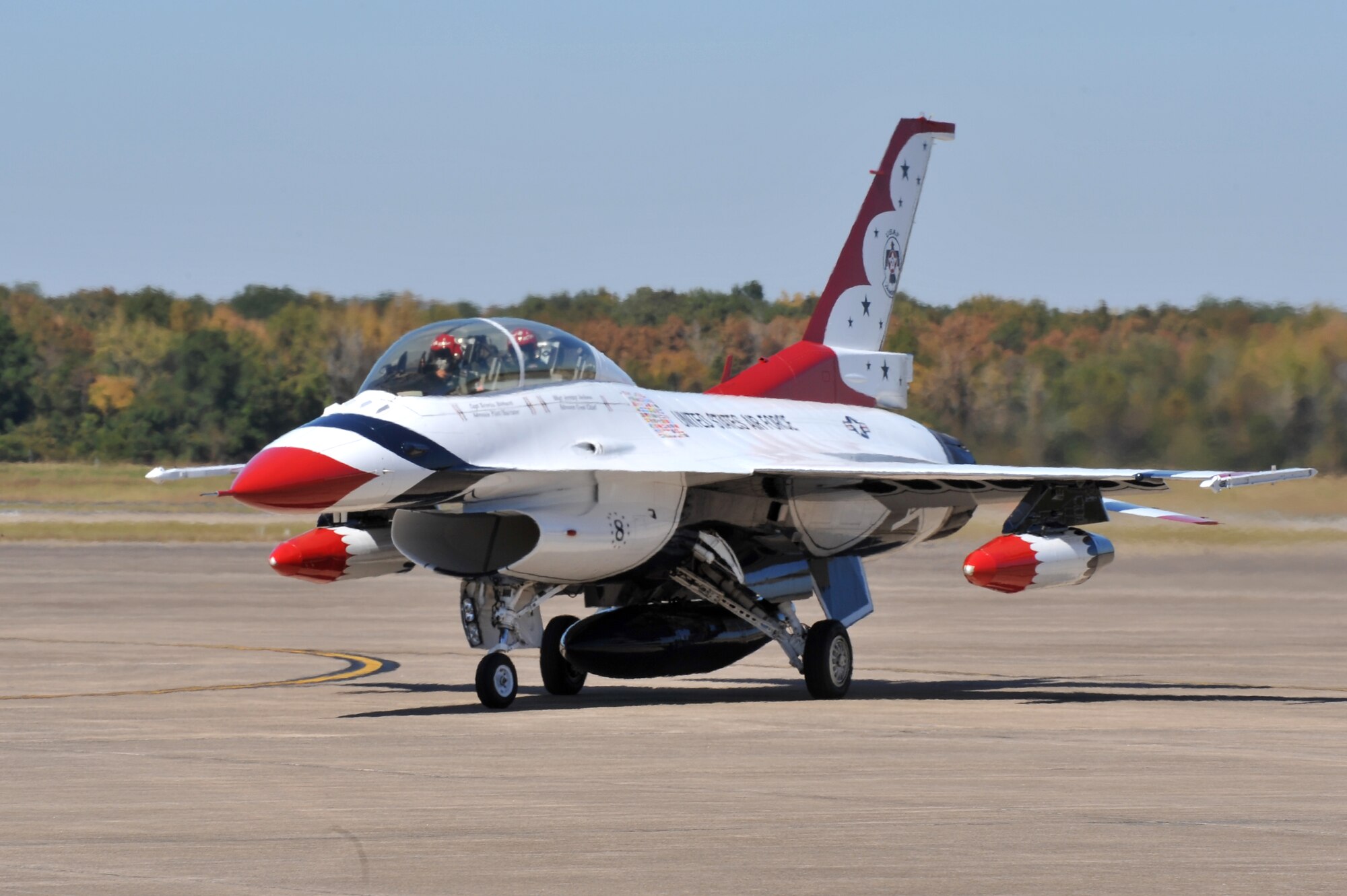 Capt. Kristin Hubbard, No. 8, a member of the Air Force Thunderbirds F-16 demonstration team, taxi in on the base runway Oct. 6. The Air Force Thunderbirds F-16 demonstration team is headlining the base’s air show Oct. 9-10.  (U.S. Air Force photo by Staff Sgt. Chris Willis)