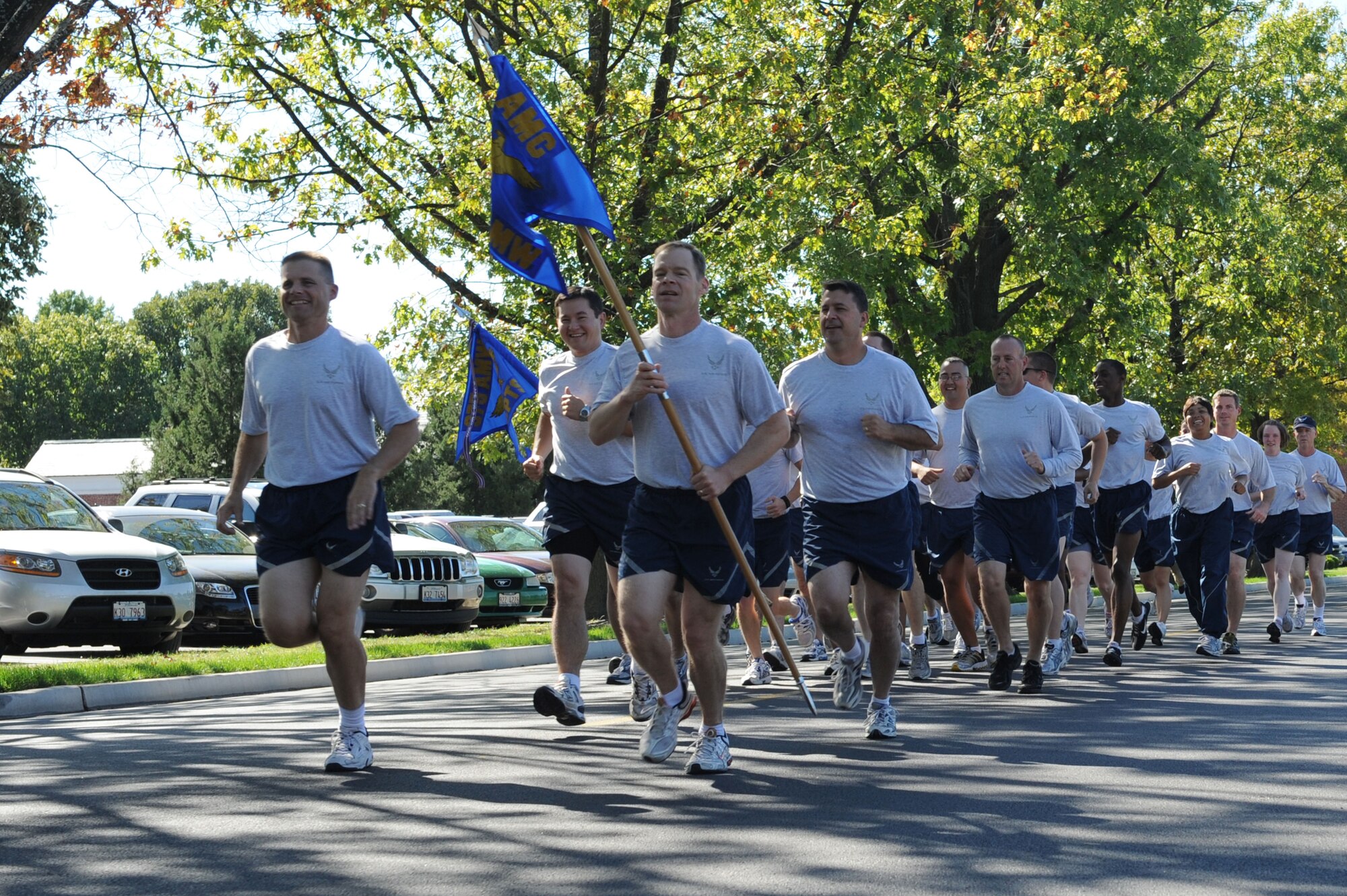 SCOTT AIR FORCE BASE, Ill. -- Members of the 375th Air Mobility Wing staff begin the two-mile run portion of the Commander Challenge Oct. 1. This is the first challenge in what will become a monthly event. (U.S. Air Force photo/Staff Sgt. Teresa Jennings)