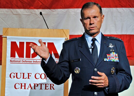 Gen. William Fraser, commander of Air Combat Command, answers a question from an audience of industry and government personnel at the Air Armament Symposium in Fort Walton Beach, Fla., Oct. 5.  The general spoke about warfighter requirements, the Joint Strike Fighter, weaponry and the future of the Air Force.  This year's 36th annual 2-day symposium highlighted topics vital to national and international defense interests. Speakers from joint services and major Air Force commands shared the common thread of working together in a changing acquisition world.  (U.S. Air Force photo/Samuel King Jr.)