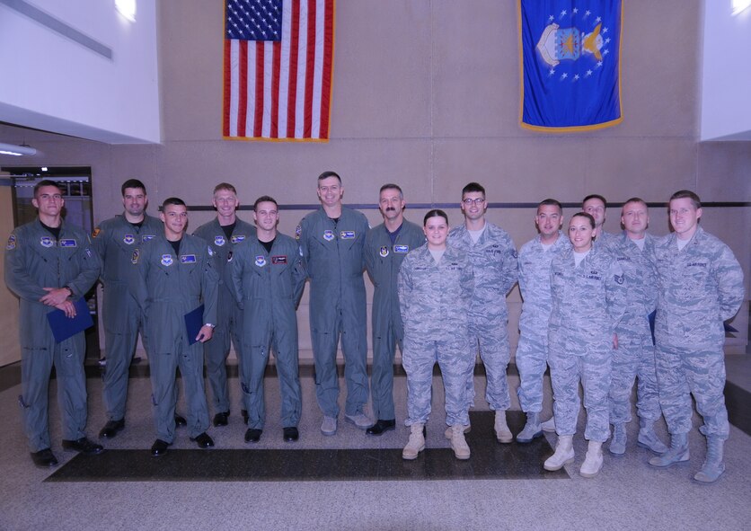 LAUGHLIN AIR FORCE BASE, Texas – Several Laughlin members who were all instrumental in a recent accident here pose with Col. Craig Wills, 47th Operations Group commander after they were named the XLer’s of the Week. The XLer is a weekly award chosen by 47th FTW leadership and given to individuals who consistently make outstanding contributions to Laughlin and their unit. (U.S. Air Force photo by Airman 1st Class Blake Mize)