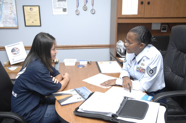 Tech. Sgt. Robyn Williams, 345th Recruiter Squadron recruiter, talks to Clarise Cabigting about the job she’ll have once she joins the Air Force. Clarise is currently in the Delayed Entry Program and waiting to go to Basic Military Training, and is one of the many lives Sergeant Williams has had the chance to effect while serving as a recruiter. (U.S. Air Force photo/Senior Airman Amber R. Kelly-Herard)
