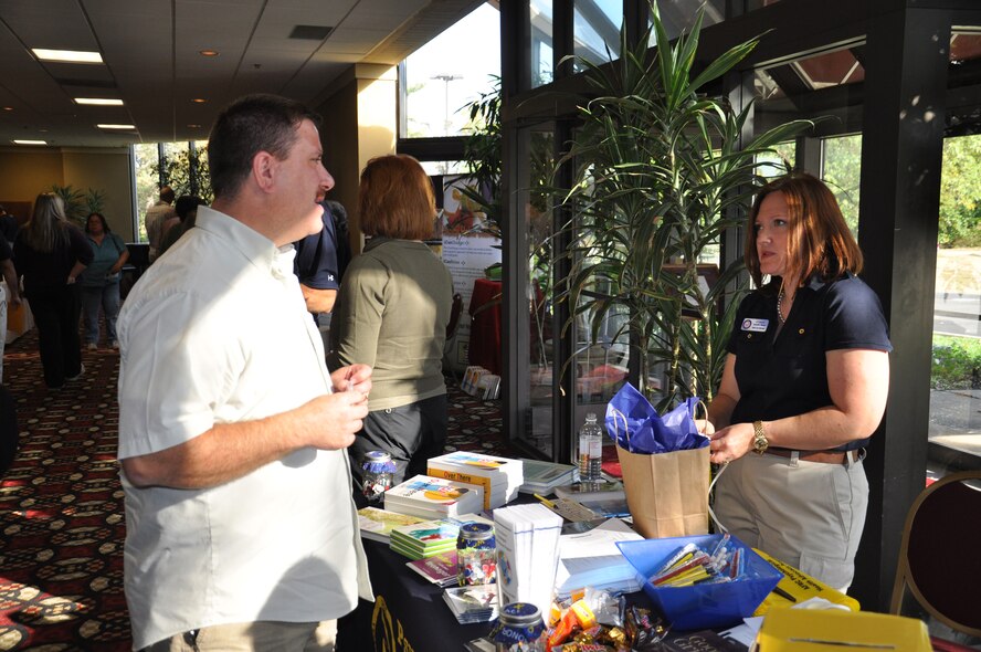 WRIGHT-PATTERSON AIR FORCE BASE, Ohio – Lt. Col. Jennifer Wedel, 445th Aeromedical Staging Squadron, spoke with attendees about the Psychological Health Advocacy program during the Yellow Ribbon event held Sept. 24-26 at the Crowne Plaza Hotel in Dublin, Ohio. (U.S. Air Force photo/Senior Airman Matthew Cook)