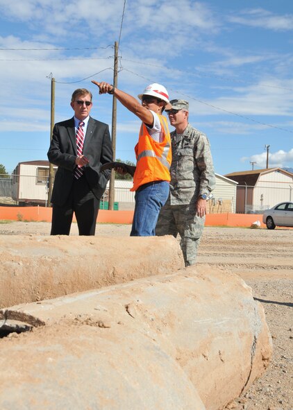 Gene Jaramillo, Army Corps of Engineers project manager, briefs the Honorable Terry Yonkers, Assistant Secretary of the Air Force for Installations, Environment and Logistics, and Col. Robert Maness, 377th Air Base Wing commander, on the construction status of the bulk fuel storage facility at Kirtland AFB, N.M.  U.S. Air Force photo by Todd Berenger (Released))