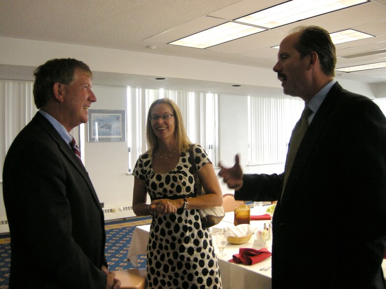 The Honorable Terry Yonkers, Assistant Secretary of the Air Force for Installations, Environment and Logistics, left, talks Oct. 5 at Kirtland AFB, N.M. with the Honorable Richard J. Berry, Mayor of Albuquerque and Bernalillo County Commissioner, District 3, Maggie Hart-Stebbins.  U.S. Air Force photo by Marie Vanover (Released)