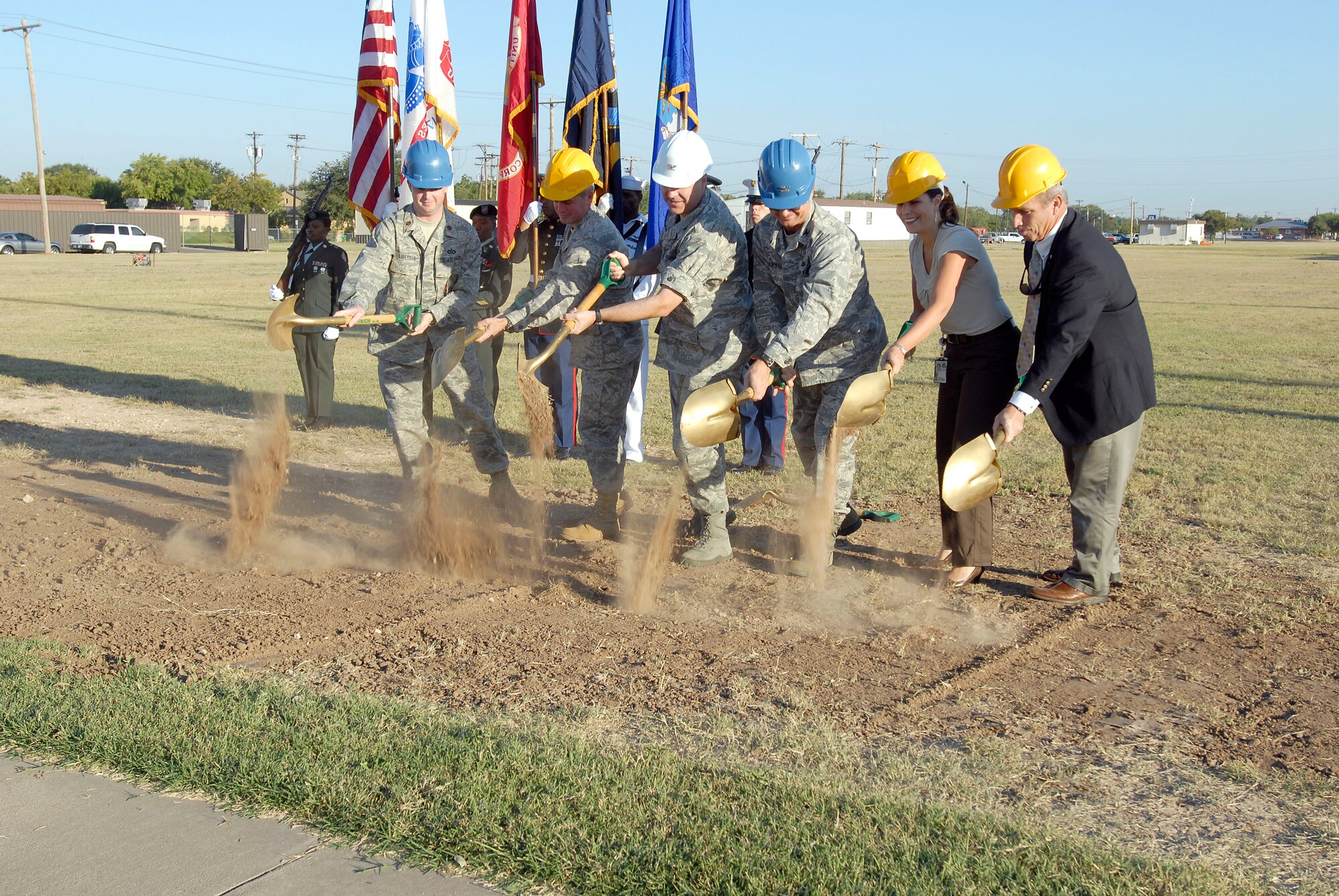 Officials break ground for the new Joint Intelligence training facility off of West Canberra Street Oct. 6.  The new 50,000 sq ft facility will house 26 classrooms and should be complete by Spring 2012. Pictured from left: Maj. Edward Liberman, 17th Civil Engineer Squadron Commander; Col. J.D. Willis, 17th Training Group Commander; Col. Thomas Geary, 17th Training Wing Commander; Col. Guy Parker, 17th Mission Support Group Commnader; Karyn Adams, United States Army Corps of Engineers, Little Rock District; and Paul Cook, Director of Operations for PBS&J Constructors Incorporated.(U.S. Air Force/Staff Sgt. Heather Rodgers)
