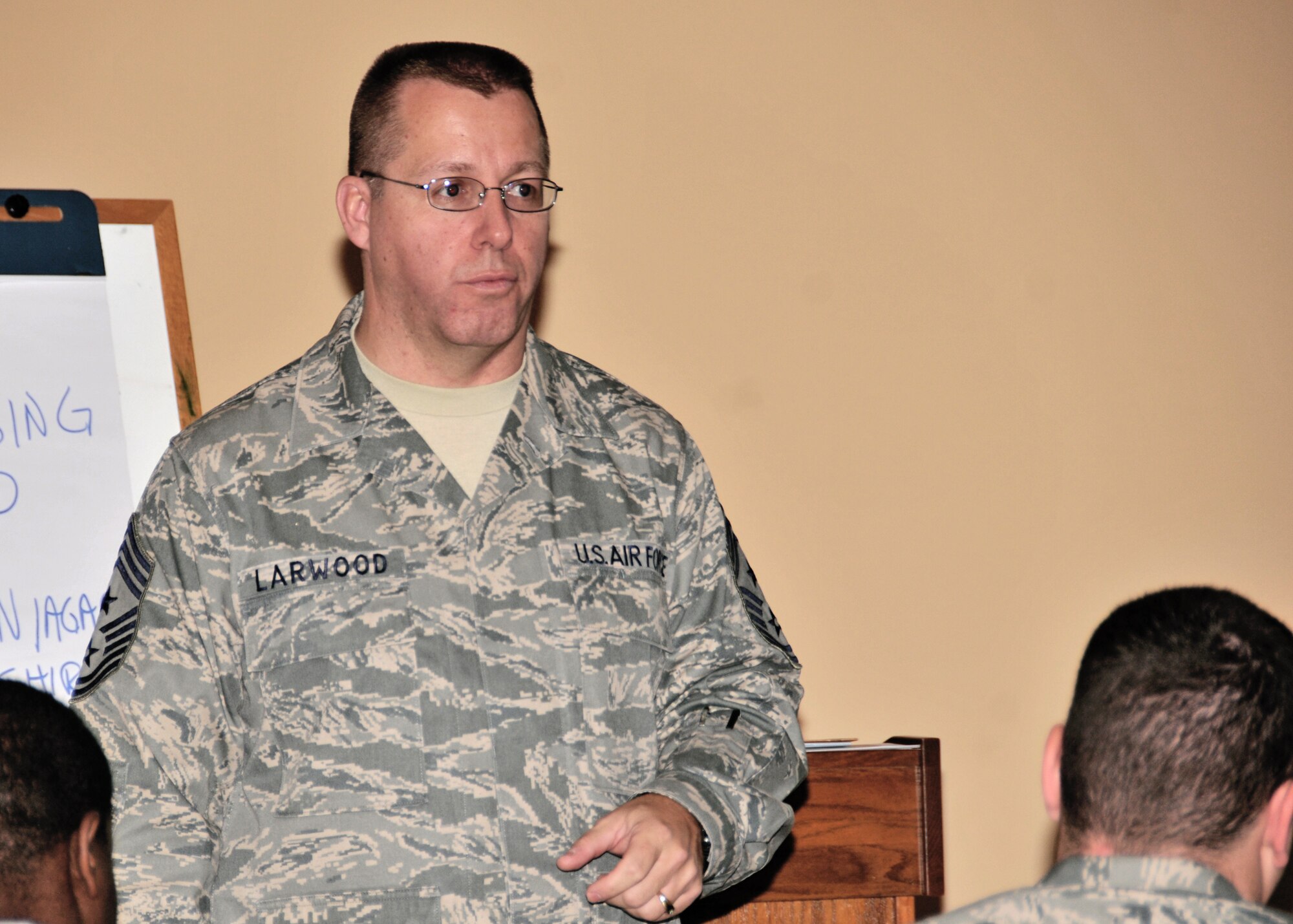 Command Chief Master Sgt. Steven M. Larwood, Headquarters, 22nd Air Force, Dobbins Air Reserve Base, GA speaks to 914th Airlift Wing Tech and Staff Sgts during the first Enlisted Force Workshop at the Niagara Falls Air Reserve Station October 5, 2010, Niagara Falls NY. The Enlisted Force Workshop was held to educate Airman on the benefits and responsibilities of their rank and service. (U.S. Air Force photo by Staff Sgt Joseph McKee)