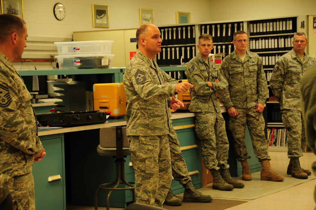 Chief Master Sgt. Dwight Badgett, Air Force Reserve Command command chief, speaks with Airmen from the 914th Maintenance Squadron about key issues that affect every Airman. Chief Badgett visited Niagara Air Reserve Station during the October Unit Training Assembly as part of his commitment to visit 36 installations over 36 months. During his visit, the chief visited Airmen from nearly every unit, speaking about important elements of being an Air Force reservist and asking for anyone to present questions, concerns or advice to take back to command. (Air Force photo/Senior Airman Chelsea Gitzen)