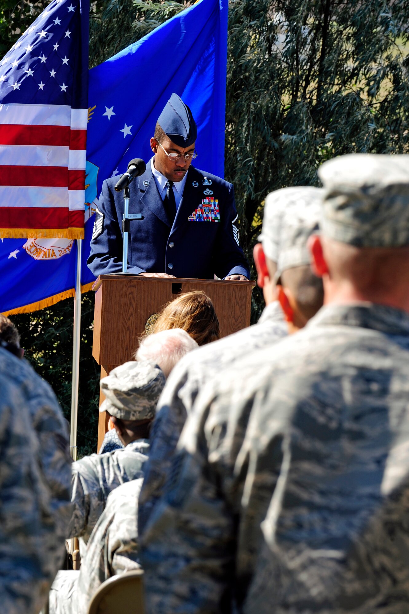 ELLSWORTH AFB, S.D. - Master Sgt. Anthony Blackmon, 28th Civil Engineer Squadron explosive ordnance disposal flight chief, speaks during a memorial service in honor of Staff Sgt. Bryan Berky at Heritage Park, Oct. 1.  Sergeant Berky was killed in action Sept. 12, 2009 while in support of Operation Enduring Freedom. (U.S. Air Force photo/Staff Sgt. Marc I. Lane)
