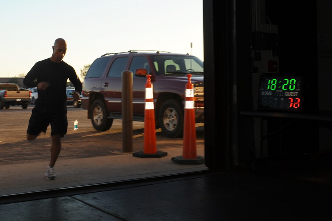 ELLSWORTH AFB – Staff Sgt. Toribio Garcia, 28th Bomb Wing paralegal, crosses the finish line of the 2nd Annual POW/MIA Remembrance 5k Run, Oct. 1. Sergeant Garcia finished first out of more than 400 participants. (U.S. Air Force photo/Senior Airman Kasey Close)