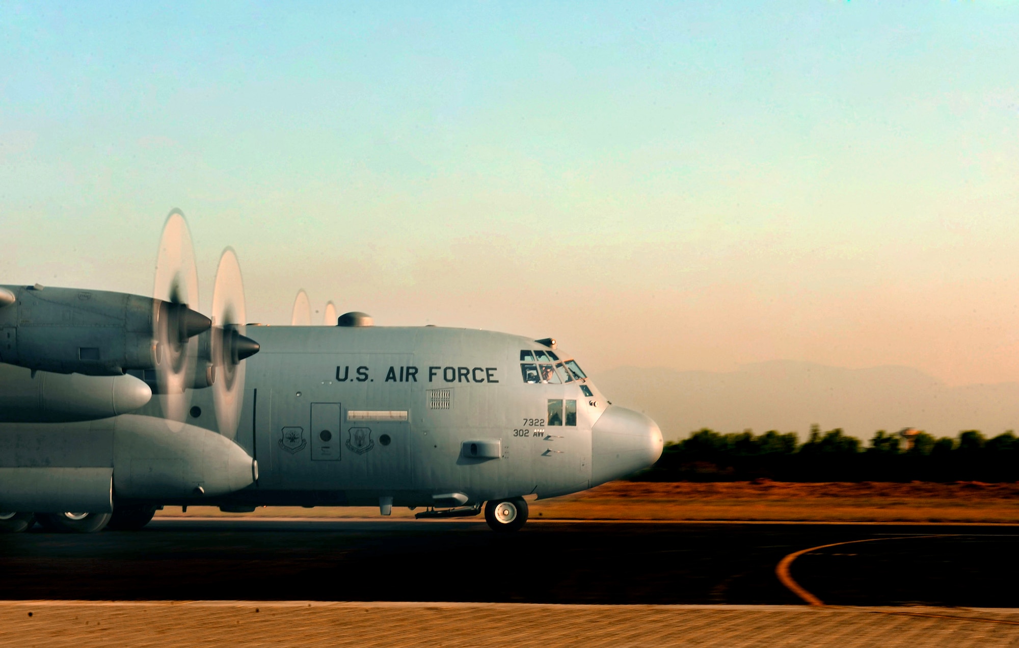 U.S. Air Force C-130 Hercules takes off Oct. 3, 2010 from Pakistan Air Force Base Chaklala to deliver flood relief aid to Skardu Airport in northern Pakistan. U.S. military aircraft, working in close coordination with the Pakistan military, have transported more than 6.6 million kilograms of relief supplies and evacuated 21,000 people in the flood-affected regions of Pakistan during August and September. (U.S. Air Force photo/Staff Sgt. Andy Kin) 