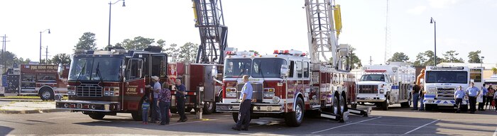 Surrounding area fire departments? fire trucks and equipment were put on display for patrons during the fire prevention fair held onboard Joint Base Charleston-Weapons Station, S.C., Oct. 5, 2010. Firefighters provided tours and in-depth details about the equipment that effectively fights fires and saves lives. The event, held in recognition of National Fire Prevention Week, stressed the importance of fire safety and increasing awareness in the Charleston area. (U.S. Navy photo by Mass Communication Specialist 1st Class Jennifer R. Hudson/released)