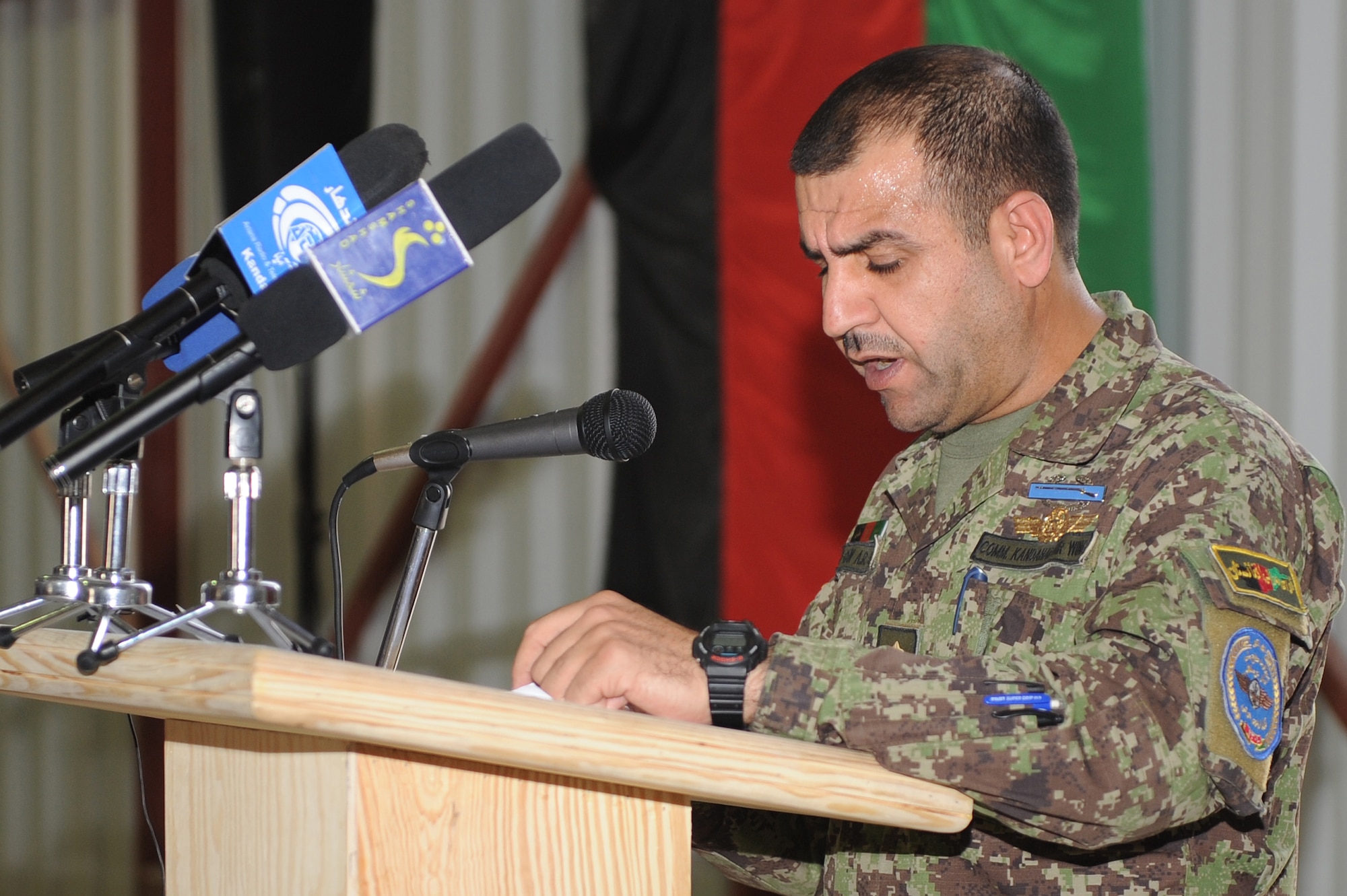Maj. Gen. Abdul Raziq Sherzai addresses Afghan Airmen and Kandahar provincial elders during a celebration marking the first anniversary of the activation of the Kandahar Air Wing, Oct. 5, 2010, at Kandahar Airfield, Afghanistan.  General Sherzai is the KAW commander.  (U.S. Air Force photo by Tech. Sgt. Chad Chisholm/Released)