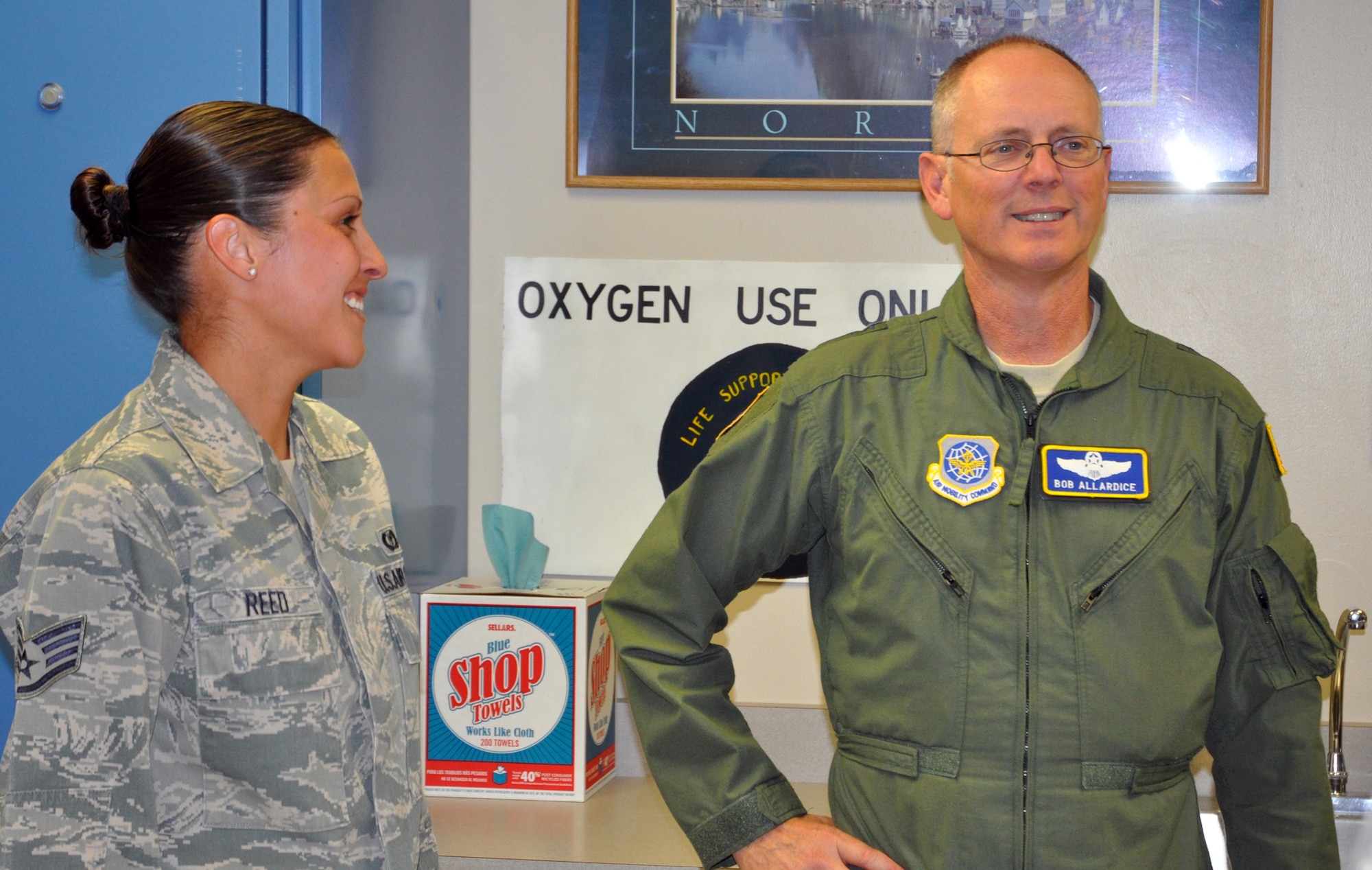 Lt. Gen. Robert Allardice, 18th Air Force commander (right) meets with Staff Sgt. Christina Reed during a Oct. 3 visit to the 302nd Airlift Wing at Peterson Air Force Base, Colo. The general's visit allowed for a better insight into how the wing's Total Force Integration is executed during an Air Force Reserve duty weekend. Sergeant Reed is an aircrew flight equipment technician with the 302nd Operations Support Squadron. (U.S. Air Force photo/Tech. Sgt. Daniel Butterfield)