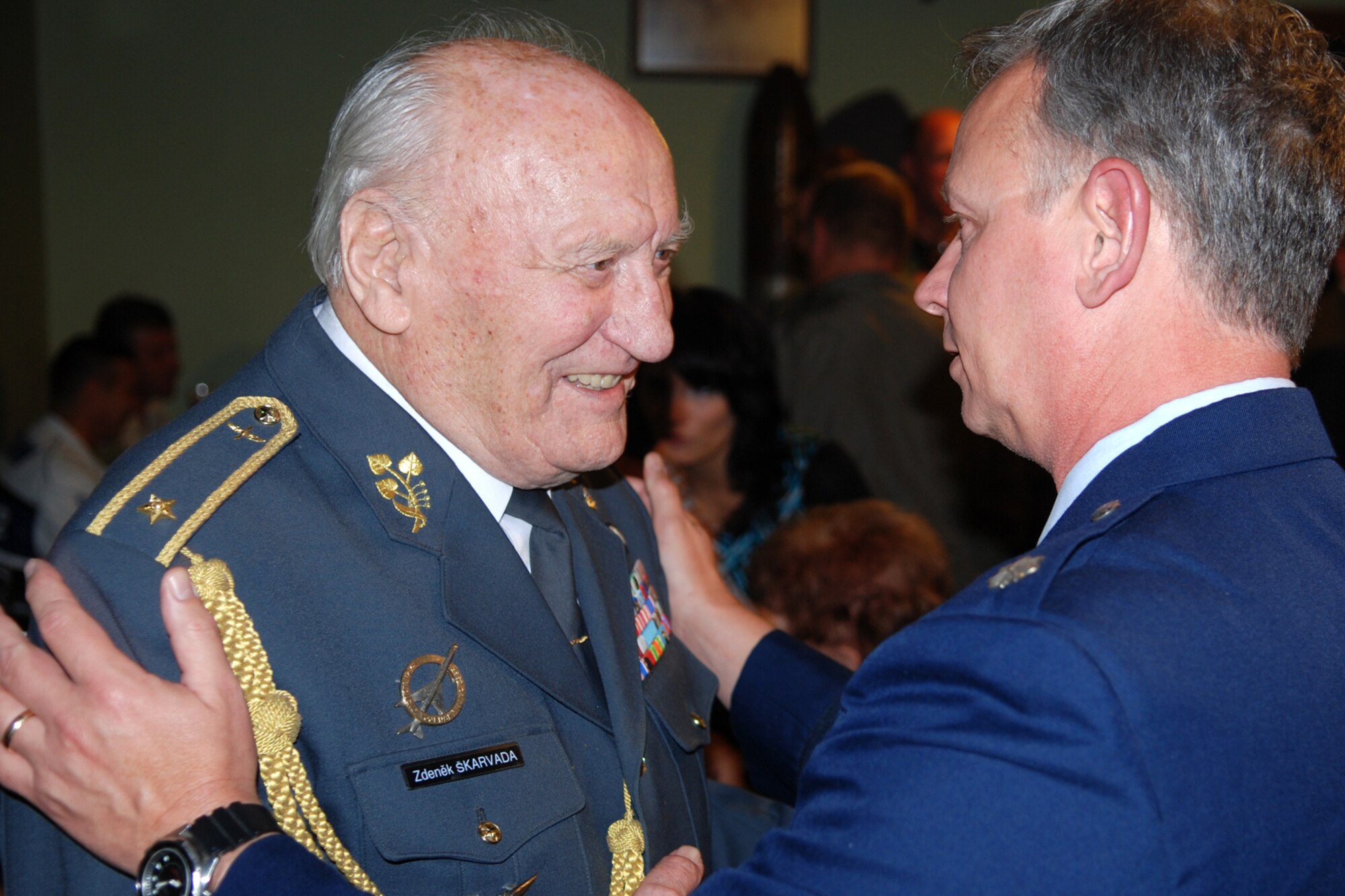 Lt. Col. Joseph “Doc” Jones, 93rd Bomb Squadron commander meets Brigadier General (Ret.) Zdenek Skarvada, at a local gathering in Ostrava, Czech Republic, Sept. 17, 2010. General Skarvada is a former Czechoslovak pilot who flew Hawker Hurricane aircraft for the British Royal Air Force during World War II. Colonel Jones became a part of history as a member of the B-52H Stratofortress aircrew that landed at the Leoš Janácek Airport in support of 10th Annual NATO Days in Ostrava on Sept. 15, 2010. The air show is the largest air, army and security show in Central Europe. This marked the first-time a B-52 bomber has ever visited the Czech Republic. The 93rd BS is assigned under the 917th Wing at Barksdale Air Force Base, La. (U.S. Air Force photo/Master Sgt. Greg Steele) 