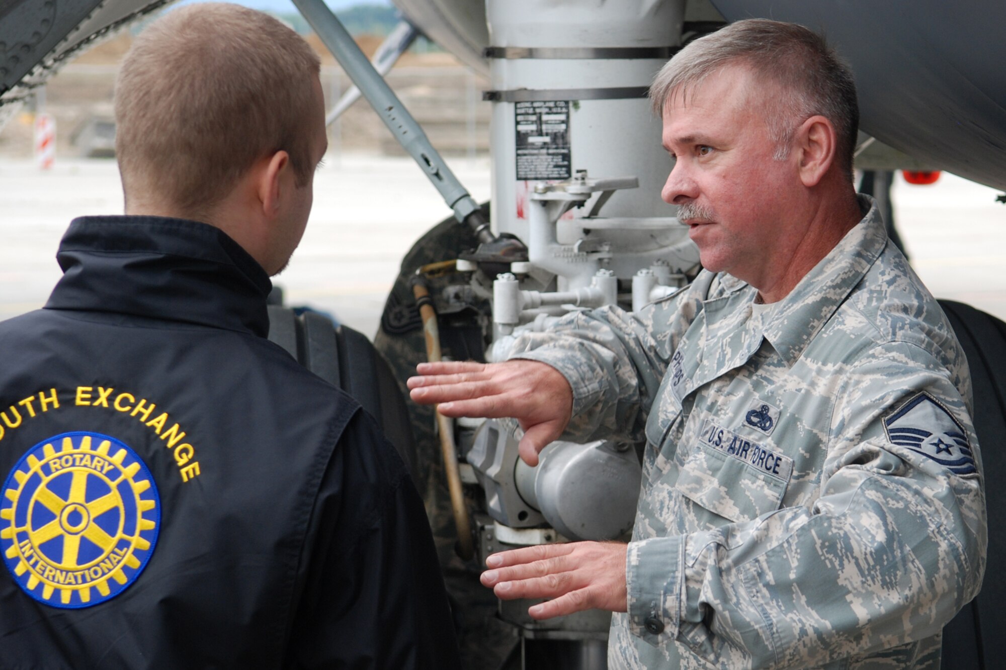 Master Sgt. Wesley Phillips, 917th Aircraft Maintenance Squadron, flight chief, fields a question from an interested spectator after the arrival of a 917th Wing B-52H Stratorfortress to the Leoš Janácek Airport in Ostrava, Czech Republic, Sept. 15, 2010. This marked the first-time a B-52 bomber has visited the Czech Republic. It was flown there in support the 10th Annual NATO Days in Ostrava air show which is the largest air, army and security show in Central Europe. The 917th Wing is located at Barksdale Air Force Base, La. (U.S. Air Force photo/Master Sgt. Greg Steele) 