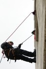 U.S. Air Force firefighters from the 180th Fighter Wing rappel down the side of a training facility at the Toledo Fire and Rescue Department Training Academy, October 5, 2010.  Firefighters from the 180th Fighter Wing are participating in six days of training designed to prepare them for various rescue situations. (U.S. Air Force photo by Senior Airman Amber Williams/Released)