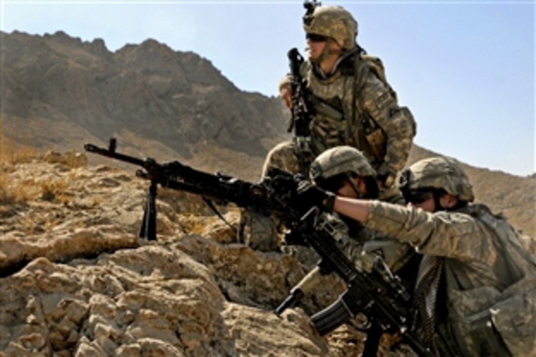 U.S. Army soldiers discuss their sectors of fire during a reconnaissance mission in Zabul province, Afghanistan, Oct. 1, 2010. The soldiers are assigned to Company C, 1st Battalion, 4th Infantry Regiment.