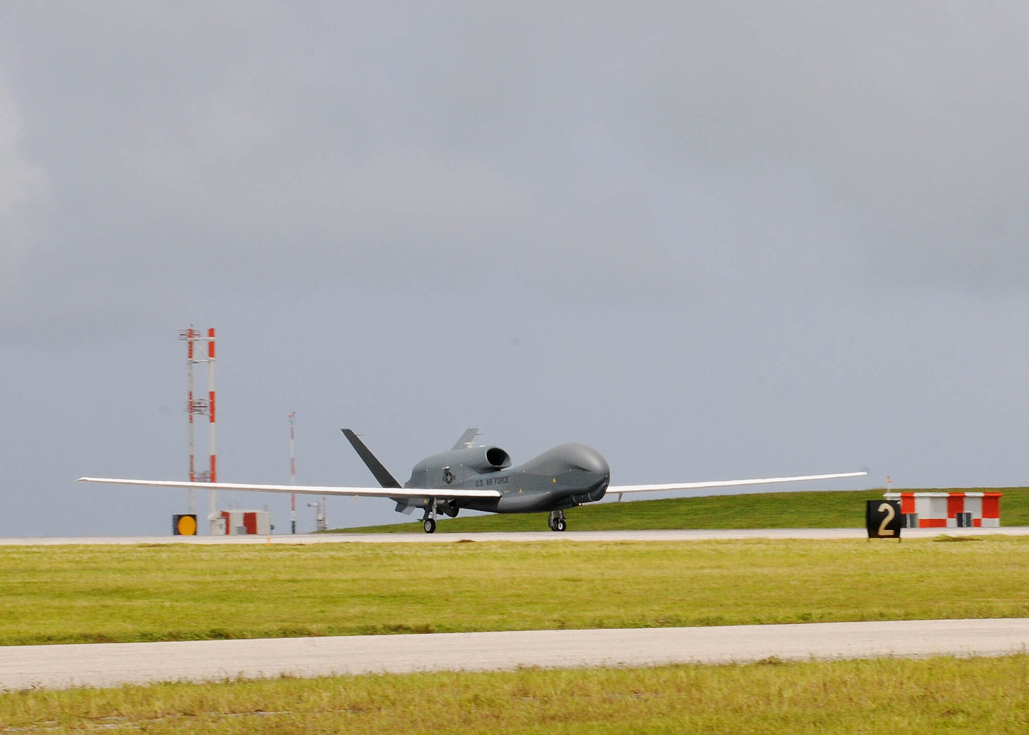 The RQ-4 Global Hawk Andersen Air Force Base, Guam, Oct. 7. This is its first take-off since its arrival ceremony and it's the only permanentlystationed aircraft on Andersen. The Global Hawk's mission is to provide a broad spectrum of intelligence, surveillance and reconnaissance collection capability to support joint combatant forces in worldwide peacetime, contingency and wartime operations. (U.S. Air Force photo/ Senior Airman Nichelle Anderson/released) 