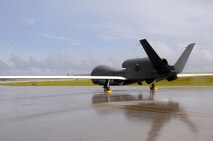 The RQ-4 Global Hawk prepares to taxi down the flight line for its first flight at Andersen Air Force Base, Guam, Oct. 7, 2010. This is its first take-off since its arrival ceremony and it's the only permanently
stationed aircraft on Andersen. The Global Hawk's mission is to provide a broad spectrum of intelligence, surveillance and reconnaissance collection capability to support joint combatant forces in worldwide peacetime, contingency and wartime operations. (U.S. Air Force photo/ Senior Airman
Nichelle Anderson/released)  
