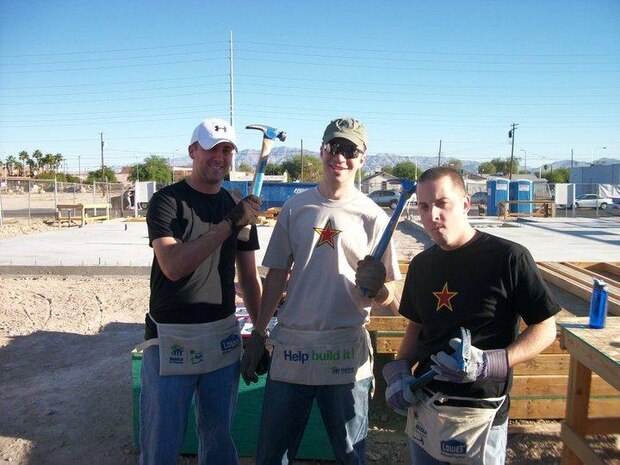 LAS VEGAS--  Staff Sgt. Aaron Iwaniec, Capt. Cory Gallagher, and Airman 1st Class Creighton Nelson were among the 10 547th Intelligence Squadron Airmen who volunteered with Habitat for Humanity. The nonprofit organization has provided more than 1.75 million people in 3,000 communities with safe, decent, affordable shelter through volunteer labor and donations of money and materials. (Courtesy photo)