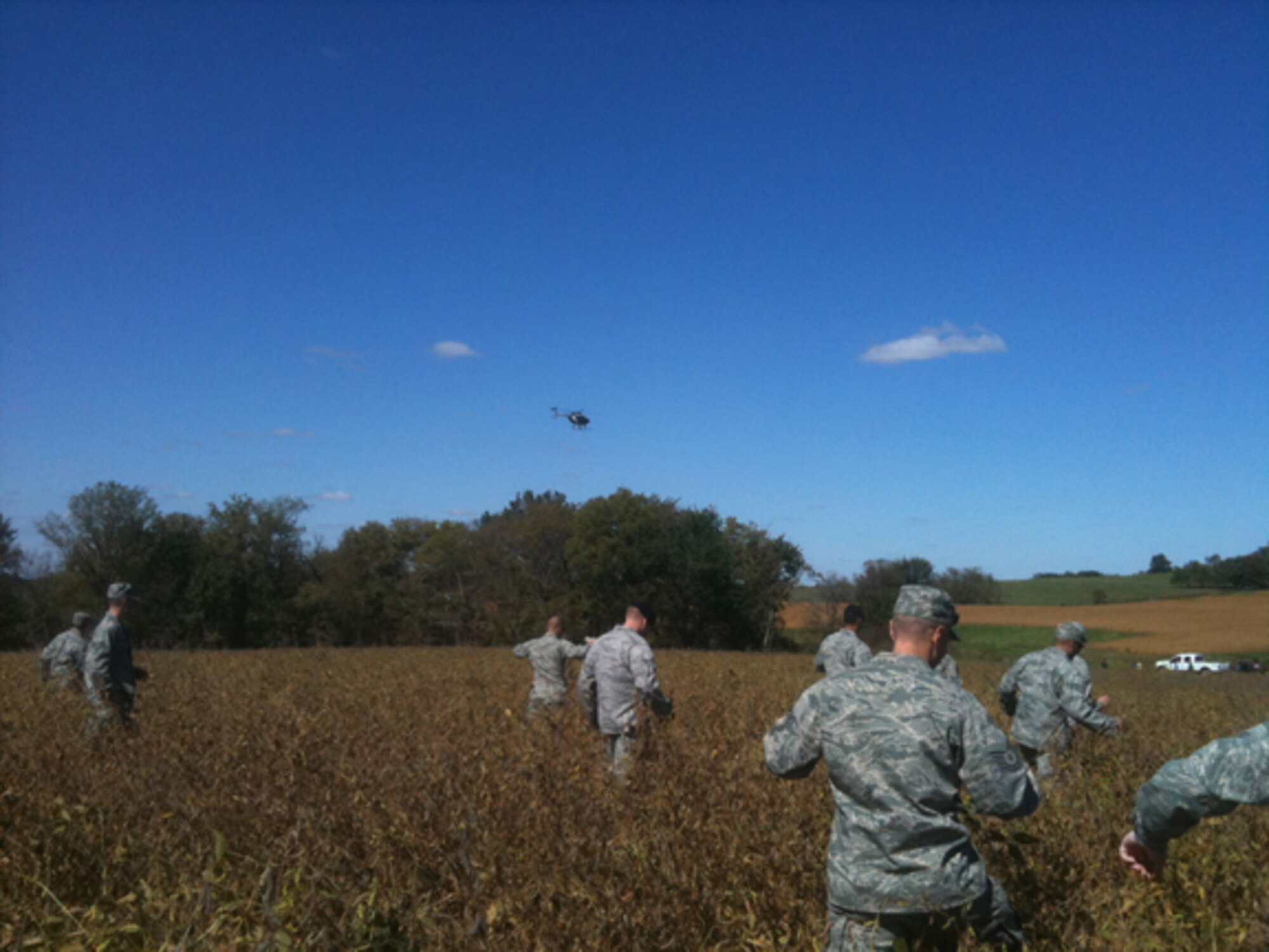 Military members from Whiteman Air Force Base assist the local authorities in searching for a missing 5-year0old boy Oct. 3, 2010. The boy was found alive and well later that afternoon. The 442nd Fighter Wing is an Air Force Reserve unit at Whiteman Air Force Base, Mo. (U.S. Air Force Photo/Tech. Sgt. Eric Hartman)