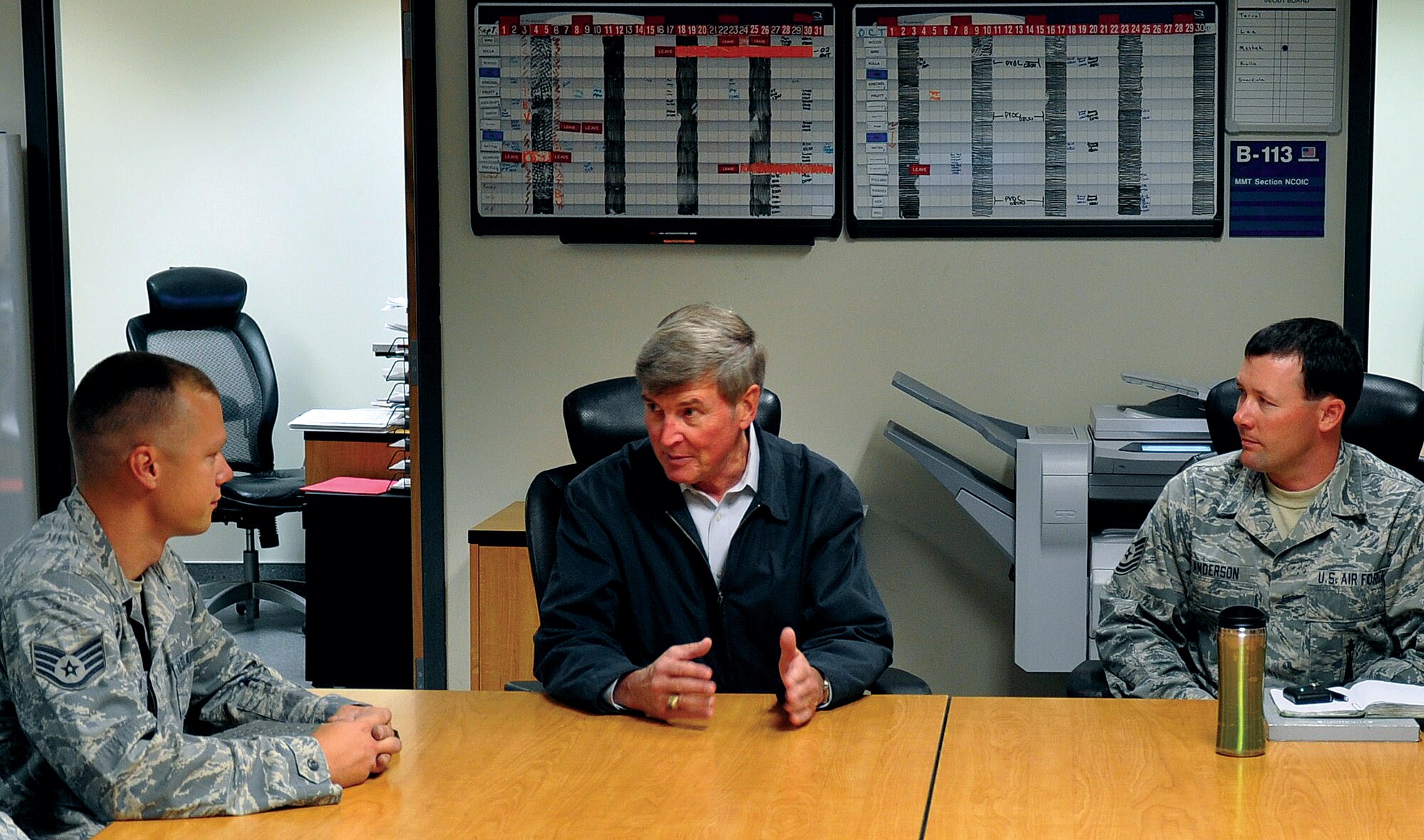 Major Gen. (ret.) Timothy McMahon, Senior Advisor to the Chief of Staff of the Air Force in Strategic Deterrence and Integration, visits with Staff Sgt. Steve Nelson and Tech. Sgt. Lance Anderson, both from the 90th Missile Maintenance Squadron, in Building 1235 on Oct. 1. Sergeant Anderson and Sergeant Nelson were part of a five-man team that included Senior Airmen Errick Wernecke, John Wissler and Joseph Brown. General McMahon met with the team before they left for the field that morning; he thanked them for their work and stressed the importance of their role in the Air Force. (U.S. Air Force photo by Airman 1st Class Dan Gage)