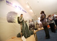 Jackie Chavis looks at the new USAF Security Forces Museum exhibit honoring the eight Security Forces Airmen killed in conflict since 2005. Mrs. Chavis's son, Airman 1st Class LeeBernard Chavis, is among the Airmen honored by the exhibit, "Into the 21st Century." Airman Chavis was killed Oct. 14, 2006, while on duty in Baghdad. (U.S. Air Force photo/Robbin Cresswell) 