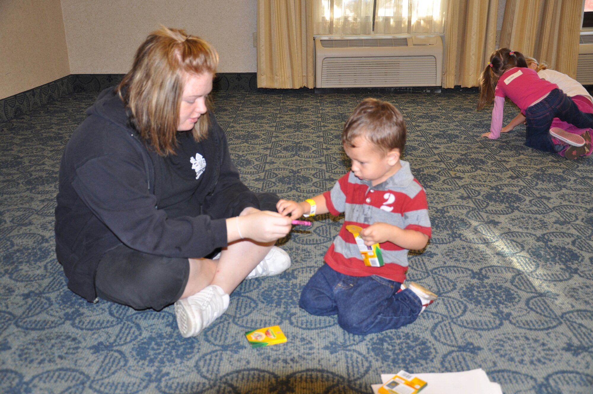 WRIGHT-PATTERSON AIR FORCE BASE, Ohio – Children of recently deployed reservists and of Airmen  getting ready to deploy engage in fun activities during the 445th Airlift Wing Yellow Ribbon event held Sept. 24-26.  Nearly 100 Airmen and their family members attended the pre-and-post deployment event at the Crowne Plaza Hotel in Dublin, Ohio and received important information about the benefits and entitlements. (U.S. Air Force photo/Senior Airman Matthew Cook)