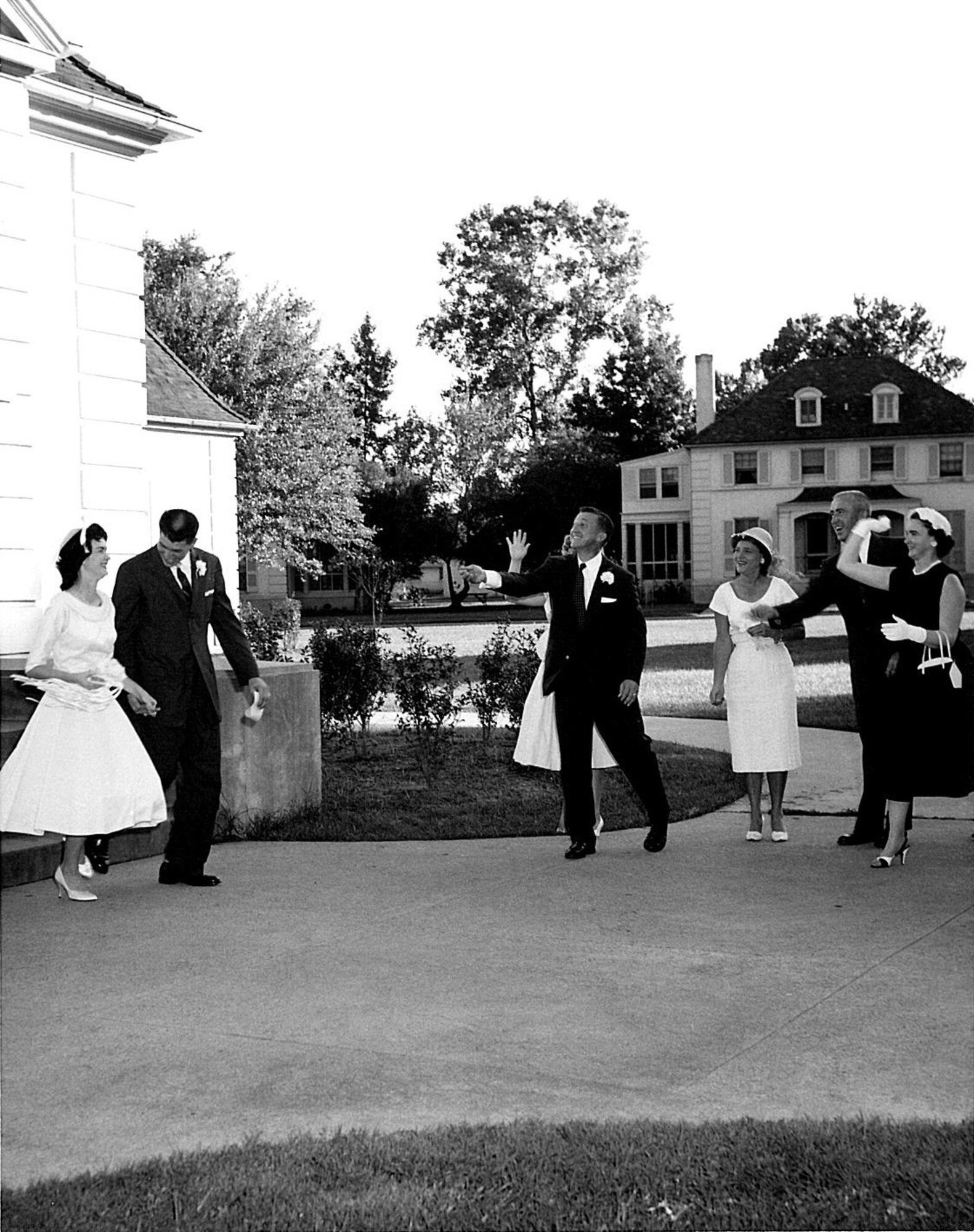 BARKSDALE AIR FORCE BASE, La. -- Nancy and Kenneth Scott walk together as husband and wife on their wedding day, August 29, 1959 at the Barksdale Chapel. Both were active-duty Air Force and stationed with the 2nd Air Force command post. Due to regulations at the time, Nancy had to separate from the AF after her marriage to Kenneth. (Courtesy photo) (RELEASED)