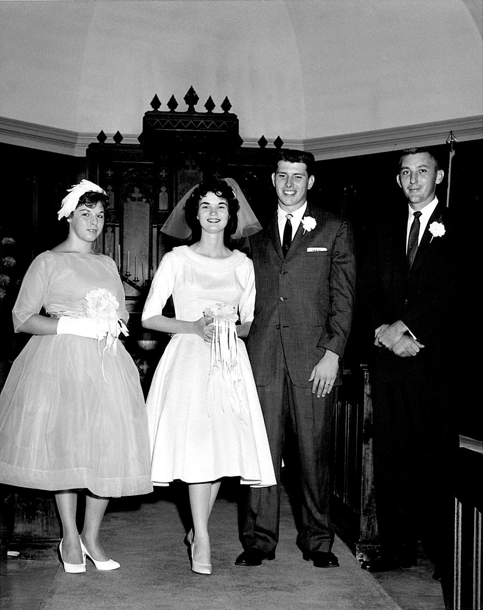 BARKSDALE AIR FORCE BASE, La. -- Nancy and Kenneth Scott (center) pose with friends on their wedding day, August 29, 1959 at the Barksdale Chapel. Both were active-duty Air Force and stationed with the 2nd Air Force command post. Due to regulations at the time, Nancy had to separate from the AF after her marriage to Kenneth. (Courtesy photo) (RELEASED)