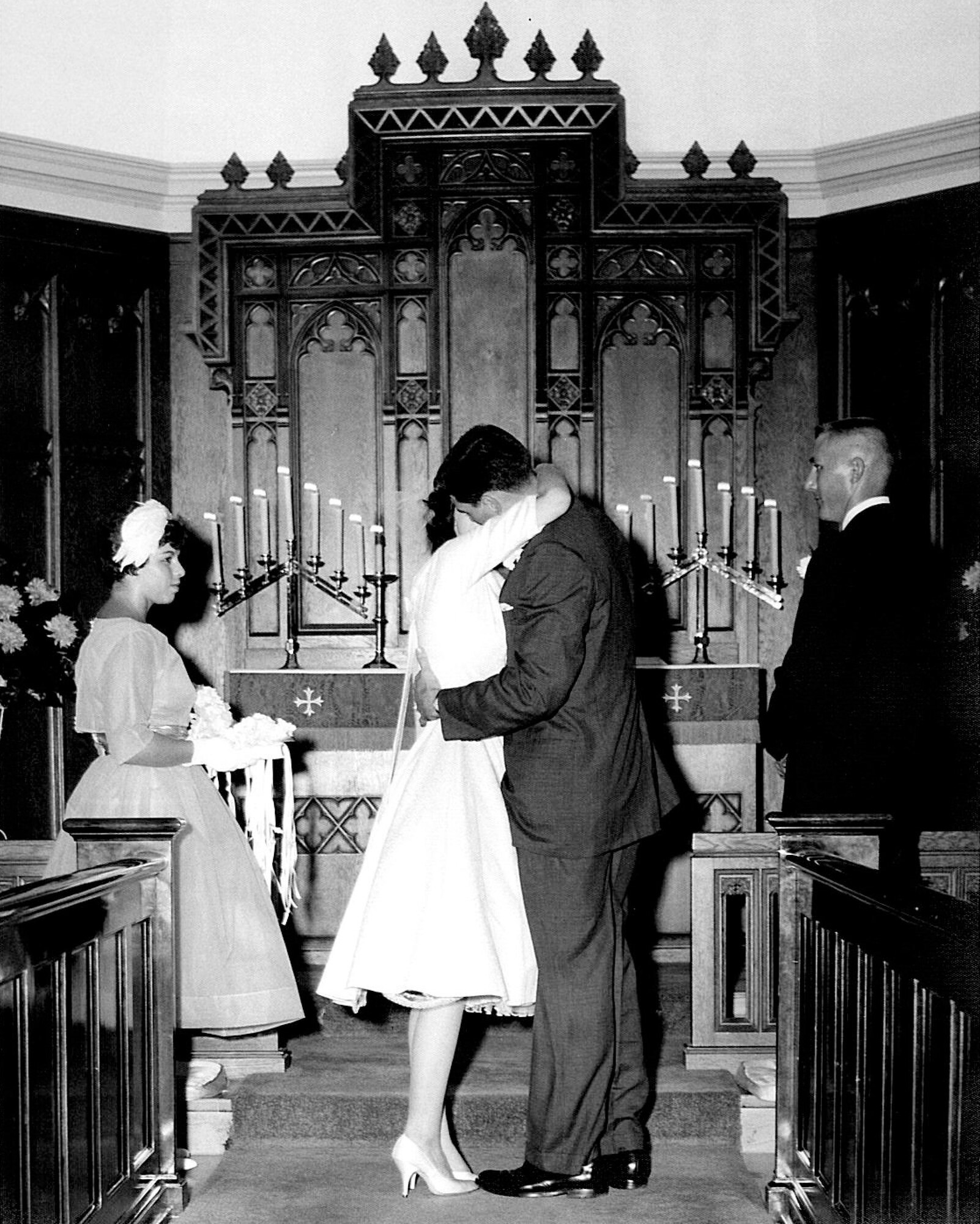BARKSDALE AIR FORCE BASE, La. -- Nancy and Kenneth Scott share a kiss on their wedding day, August 29, 1959, at the Barksdale Chapel. Both were active-duty Air Force and stationed with the 2nd Air Force command post. Due to regulations at the time, Nancy had to separate from the AF after her marriage to Kenneth. (Courtesy photo) (RELEASED)