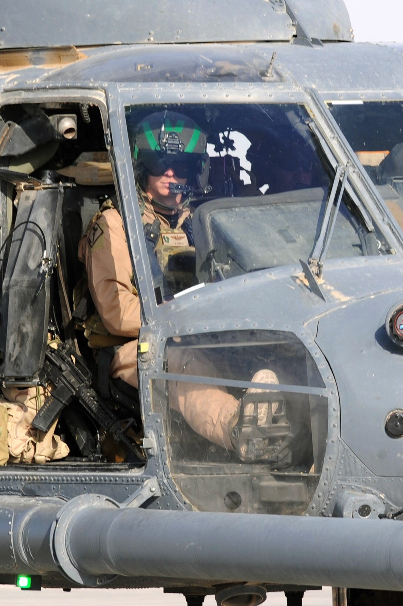 Maj. Russell Cook taxies an HH-60G Pave Hawk helicopter during a mission Oct. 1, 2010, at Kandahar Airfield, Afghanistan. Major Cook is a pilot with the 26th Expeditionary Rescue Squadron. (U.S. Air Force photo/Tech. Sgt. Chad Chisholm)