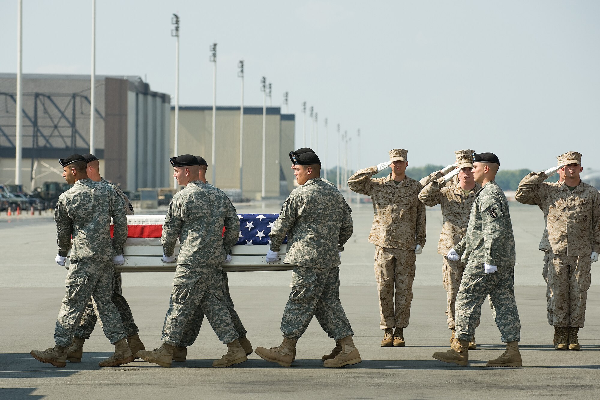 A U.S. Army carry team transfers the remains of Army Pfc. Gebrah P. Noonan of Watertown, Conn., at Dover Air Force Base, Del., Sept. 25, 2010.  Noonan was assigned to 3rd Battalion, 15th Infantry Regiment, 4th Brigade Combat Team, 3rd Infantry Division, Fort Stewart, Ga. (U.S. Air Force photo/Jason Minto)