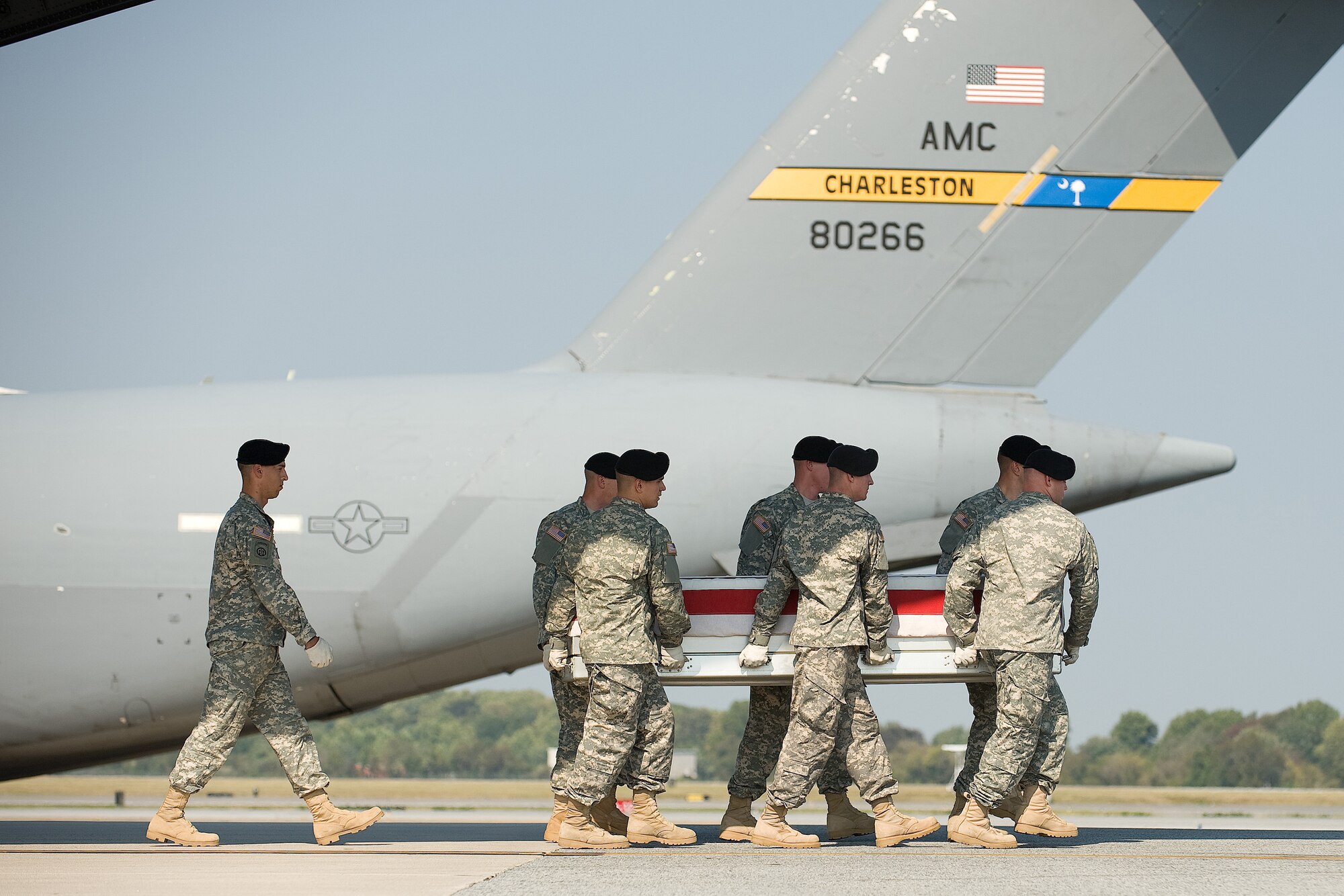 A U.S. Army carry team transfers the remains of Army Chief Warrant Officer 3 Matthew G. Wagstaff of Orem, Utah, at Dover Air Force Base, Del., Sept 22, 2010.  He was assigned to 101st Combat Aviation Brigade, 101st Airborne Division (Air Assault), Fort Campbell, Ky. (U.S. Air Force photo/Roland Balik)