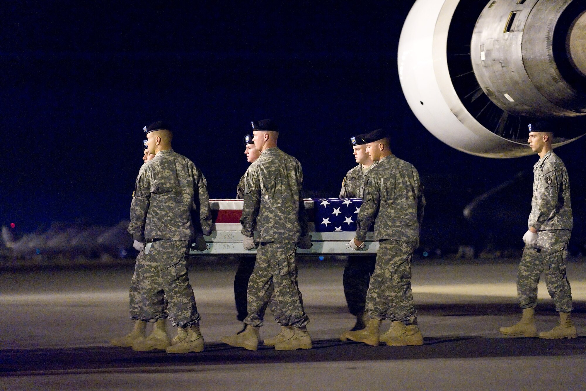 A U.S. Army carry team transfers the remains of Army 1st Lt. Eric Yates, of Rineyville, Ky., at Dover Air Force Base, Del., Sept. 18, 2010. Yates was assigned to the 1st Battalion, 502nd Infantry Regiment, 2nd Brigade Combat Team, 101st Airborne Division (Air Assault), Fort Campbell, Ky. (U.S. Air Force photo/Roland Balik)