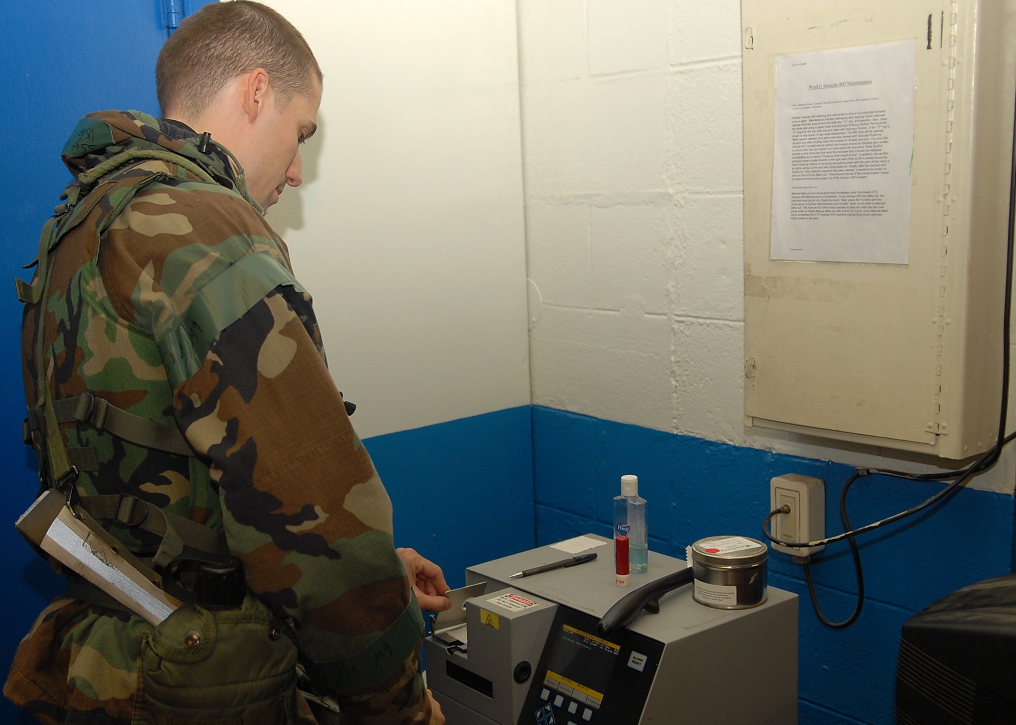 KUNSAN AIR BASE, Republic of Korea – Staff Sgt. Nicholas Tullis, 8th Communications Squadron assistant NCOIC of official mail, checks a bomb scanner for biohazards during Exercise Beverly Midnight 10-04, Oct. 6, 2010. The bomb scanner checks packages received on base for biohazards such as anthrax. During the exercise Airmen demonstrate their ability to complete the mission in various combat environments and scenarios. (U.S. Air Force photo/Senior Airman Ciara Wymbs)