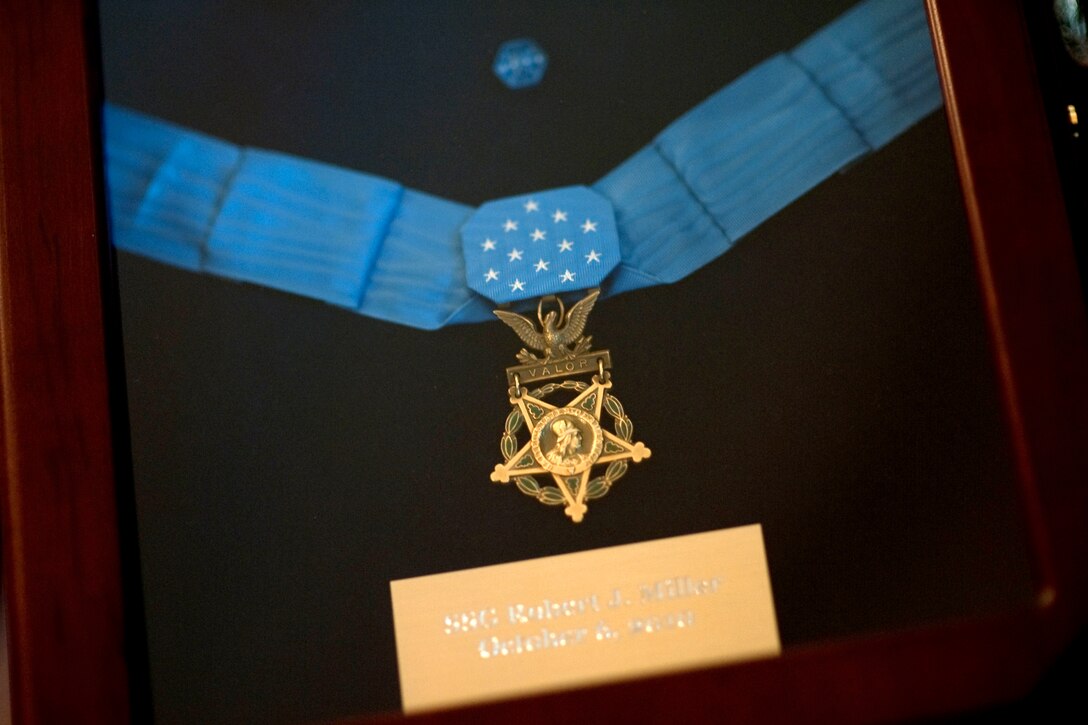 The Medal of Honor hangs within a frame after President Barack Obama posthumously awarded it to U.S. Army Staff Sgt. Robert J. Miller during a ceremony in the East Room of the White House, Oct. 6, 2010.