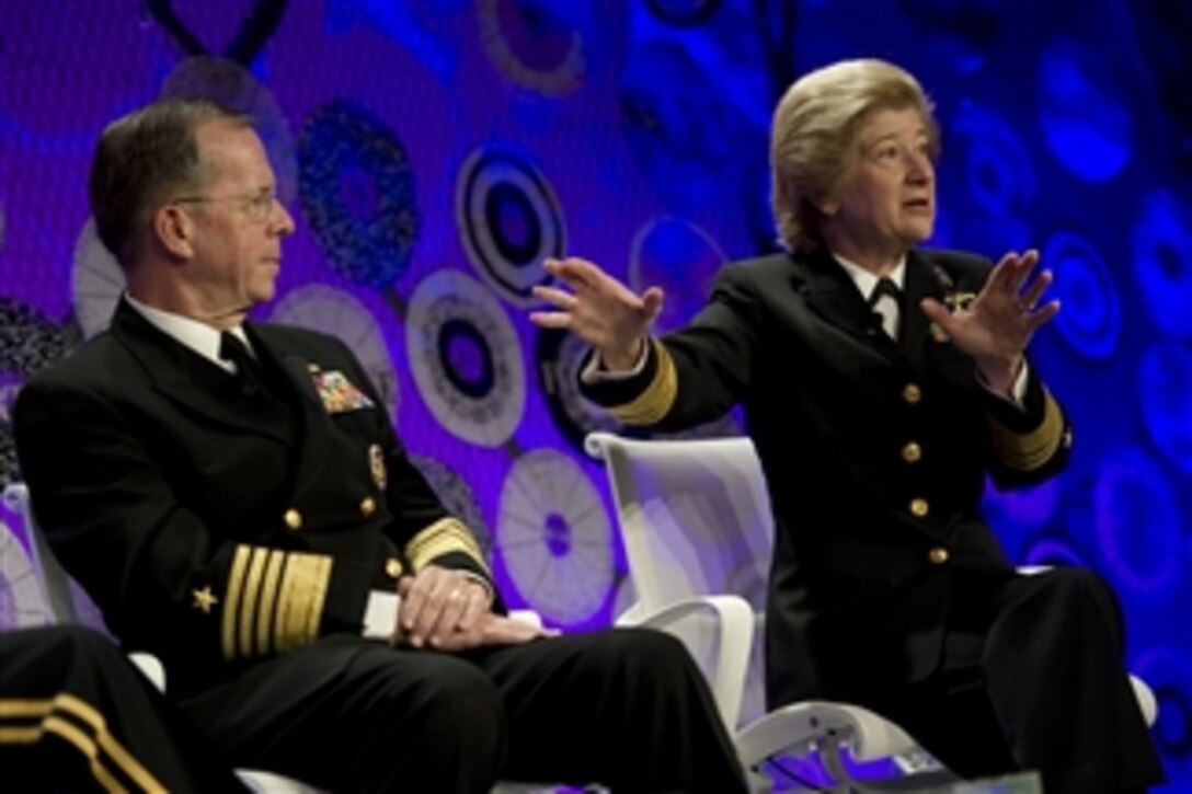 Chairman of the Joint Chiefs of Staff Adm. Mike Mullen, U.S. Navy, Gen. Ann Dunwoody and President of National Defense University Vice Adm. Ann Rondeau address audience members at the Fortune magazine's Most Powerful Women Summit in Washington, D.C., on Oct. 6, 2010.  
