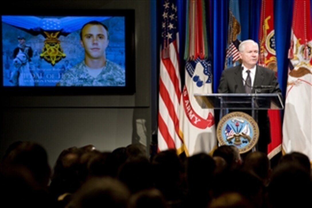 Secretary of Defense Robert M. Gates addresses the audience during a Medal of Honor ceremony for U.S. Army Staff Sgt. Robert J. Miller in the Pentagon on Oct. 7, 2010.  Miller was posthumously awarded the nation's highest honor for his heroic actions in Afghanistan on January 25, 2008, after displaying immeasurable courage and uncommon valor eventually sacrificing his own life to save the lives of his teammates and 15 Afghanistan National Army soldiers.  