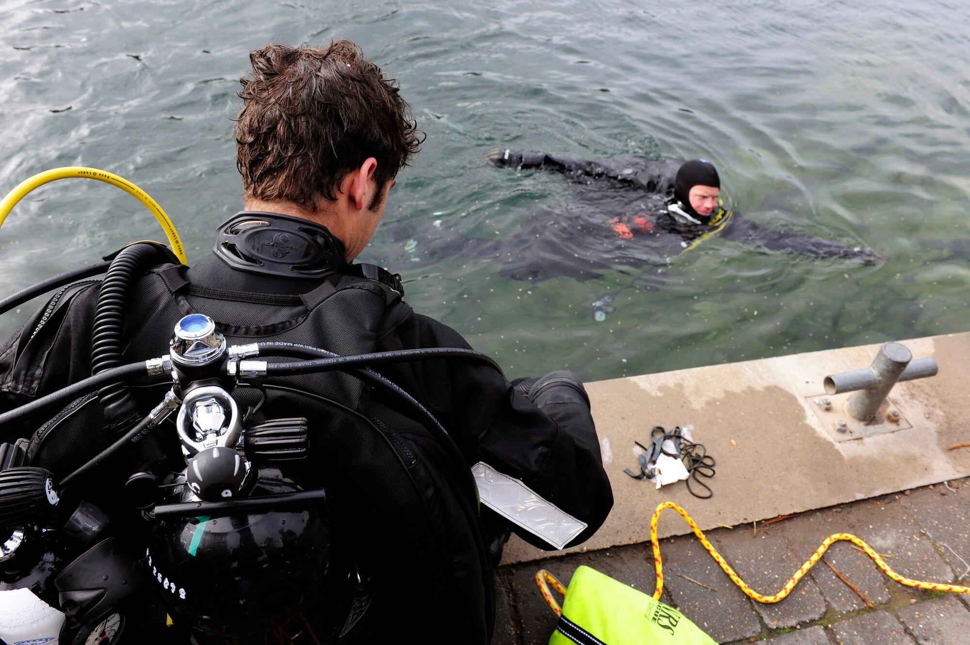 Pararescuemen from the 56th Rescue Squadron train for subsurface search, rescue and recovery Oct. 5, 2010, at Stoney Cove, England. The pararescuemen trained in a controlled environment allowing them to focus on their curriculum without being disturbed. (U.S. Air Force photo/Airman 1st Class Lausanne Morgan) 