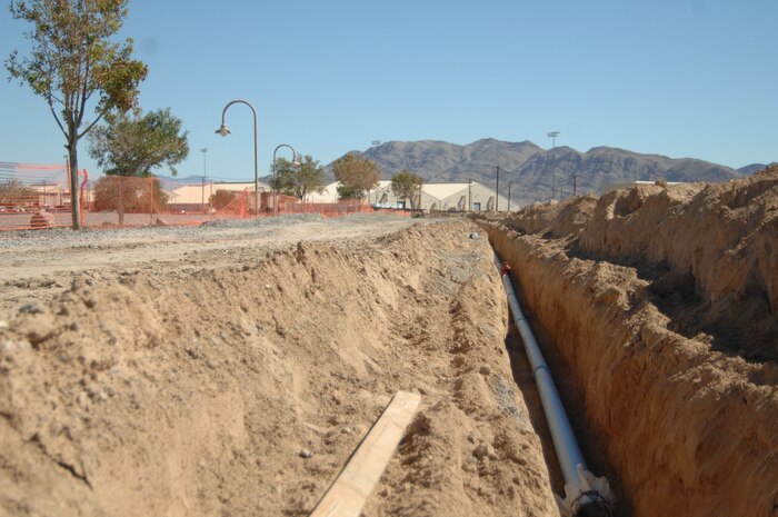 A view of the new water main line construction between Runner’s World and Tyndall Avenue. The 99th Civil Engineer Squadron began a $5 million project Sept. 27, to install approximately six miles of new domestic water main pipe. The new pipe will run from the Tyndall Gate entrance near Freedom Park to the intersection of Tyndall Ave. and Fitzgerald Ave. and from the north end of the flightline to the south end, along the east side of the aircraft hangars. (U.S. Air Force photo by 2nd Lt. Laura Balch)